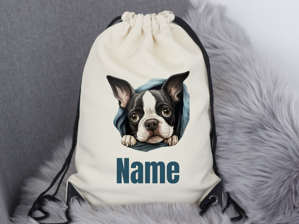 Beige Rucksack mit Hundemotiv und personalisierbarem Namen.