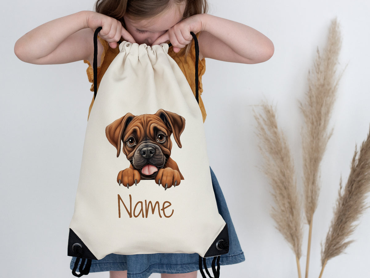 Beige Rucksack mit Hundemotiv und personalisierbarem Namen.