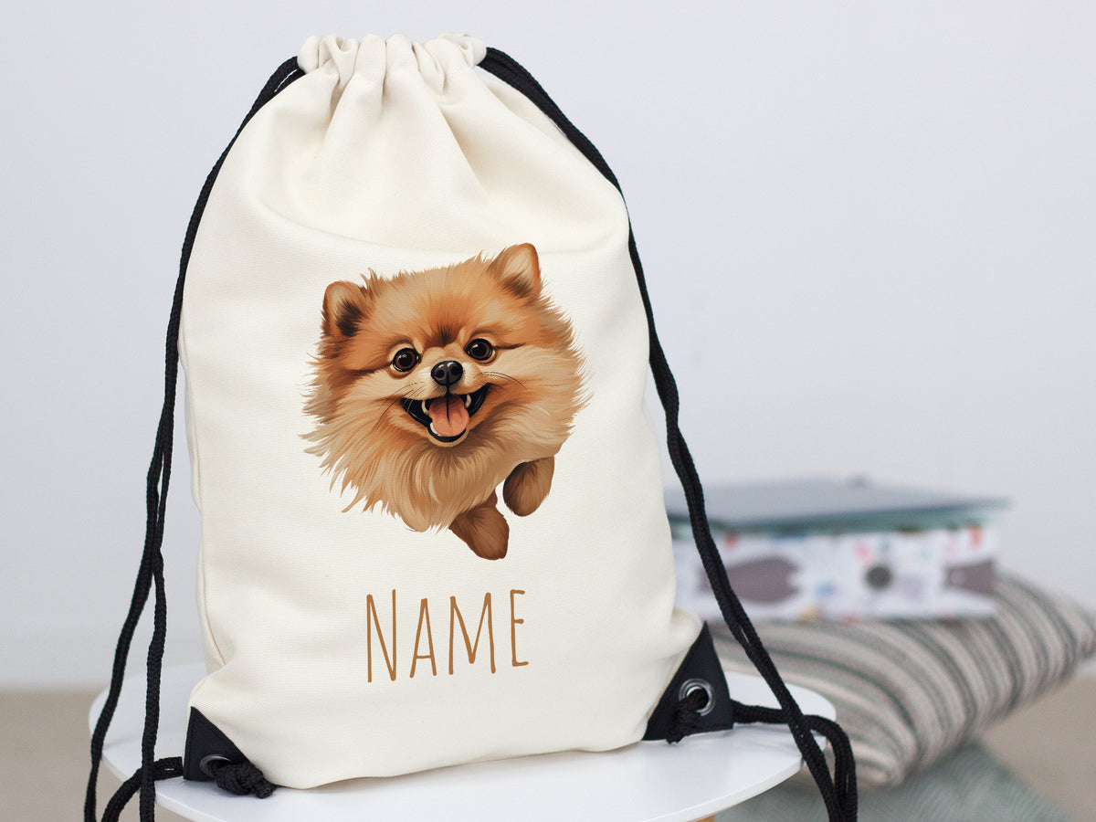 Beige Turnbeutel mit Pomeranian-Motiv und personalisierbarem Namen.