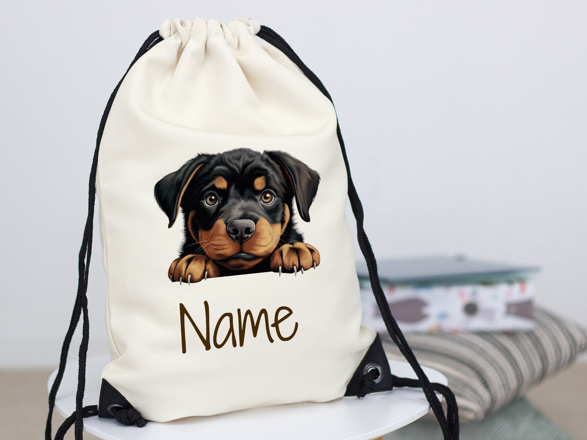 Beige Turnbeutel mit Rottweiler-Motiv und personalisierbarem Namen.