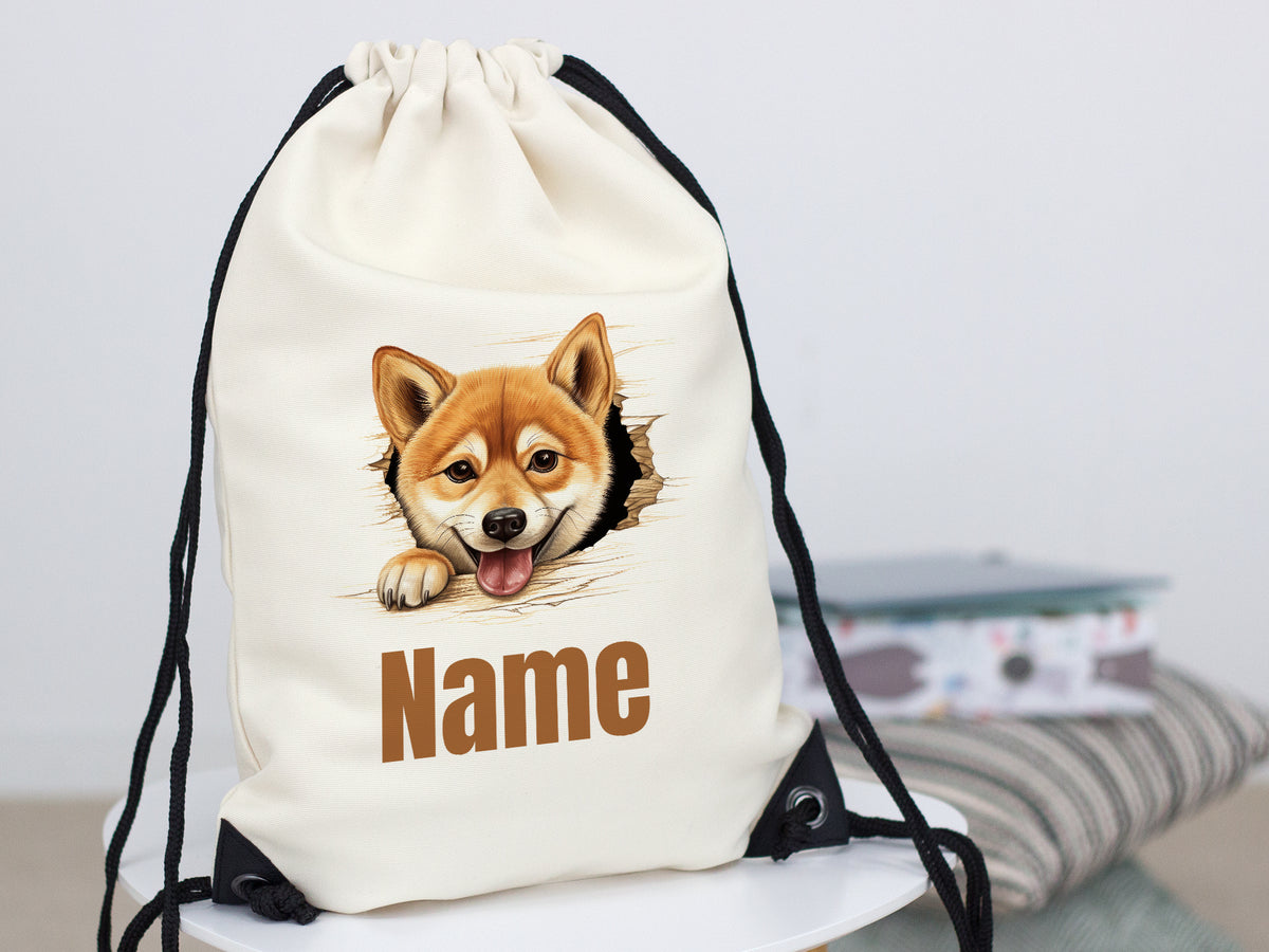 Beige Rucksack mit Corgi-Motiv und personalisierbarem Namen.