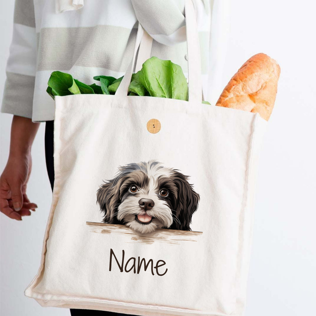 Beige Tasche mit Hundemotiv und personalisiertem Namen.