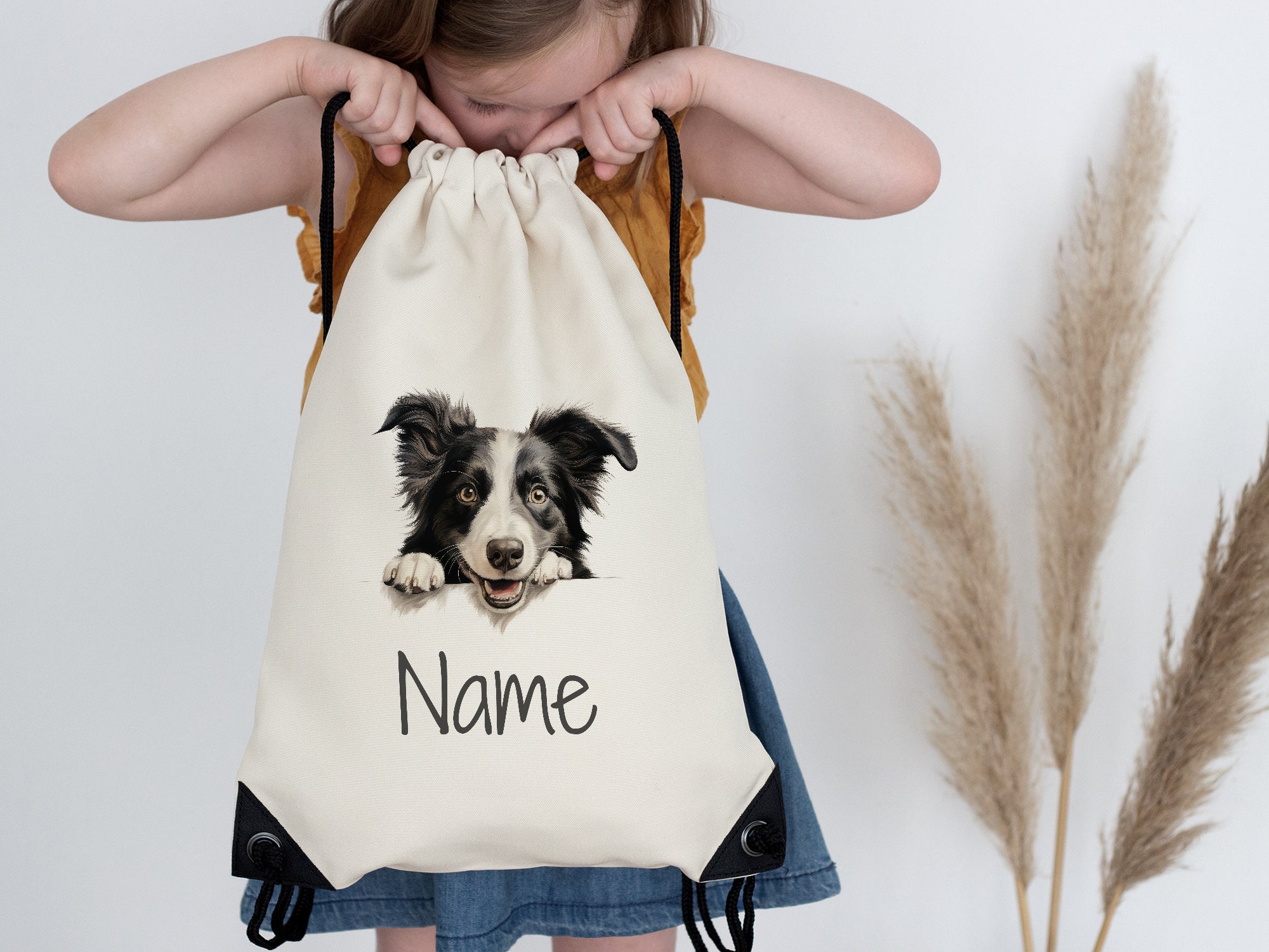 Beige Rucksack mit Border Collie und personalisierbarem Namen.