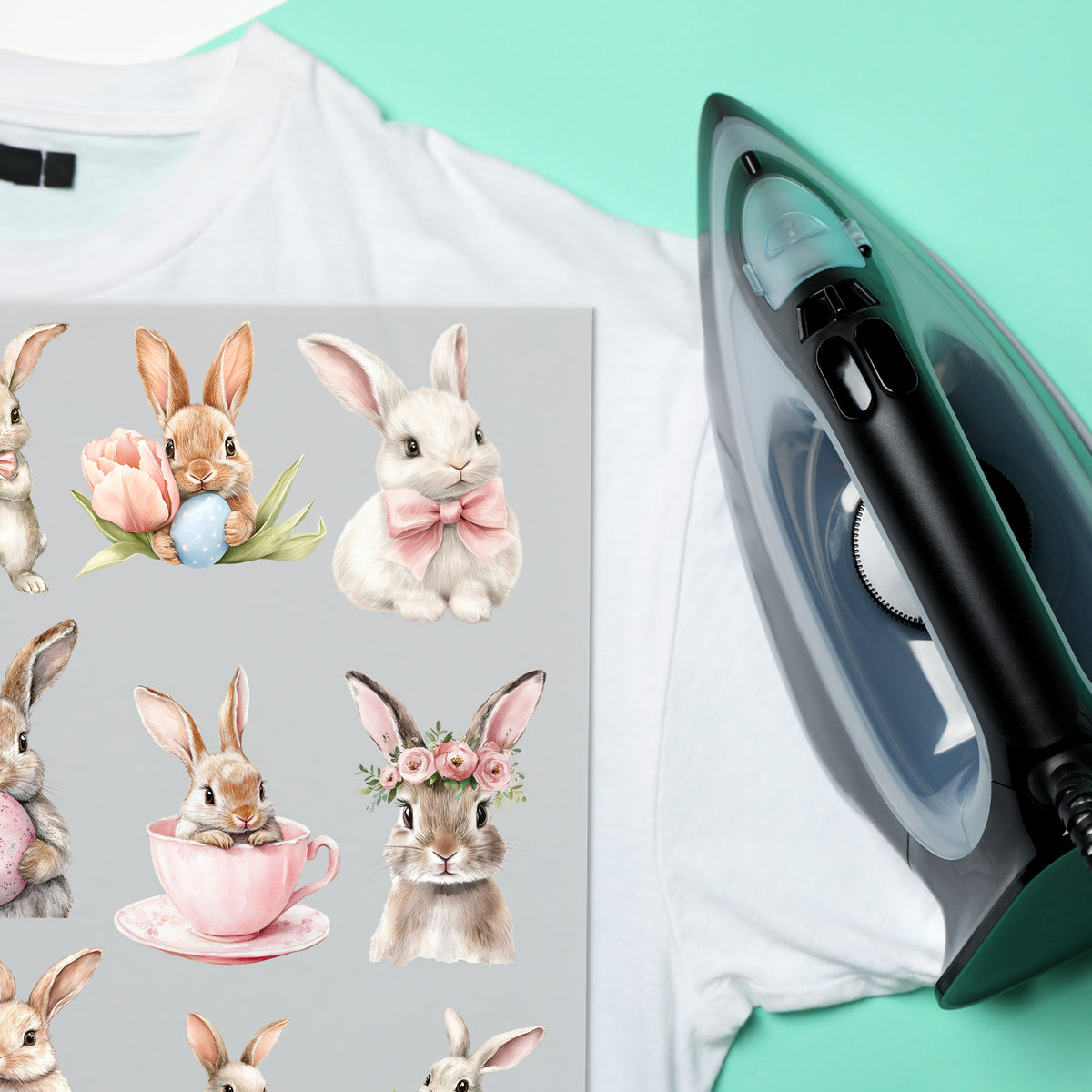 Helle T-Shirt-Drucke mit süßen Hasenmotiven und einem Bügeleisen.