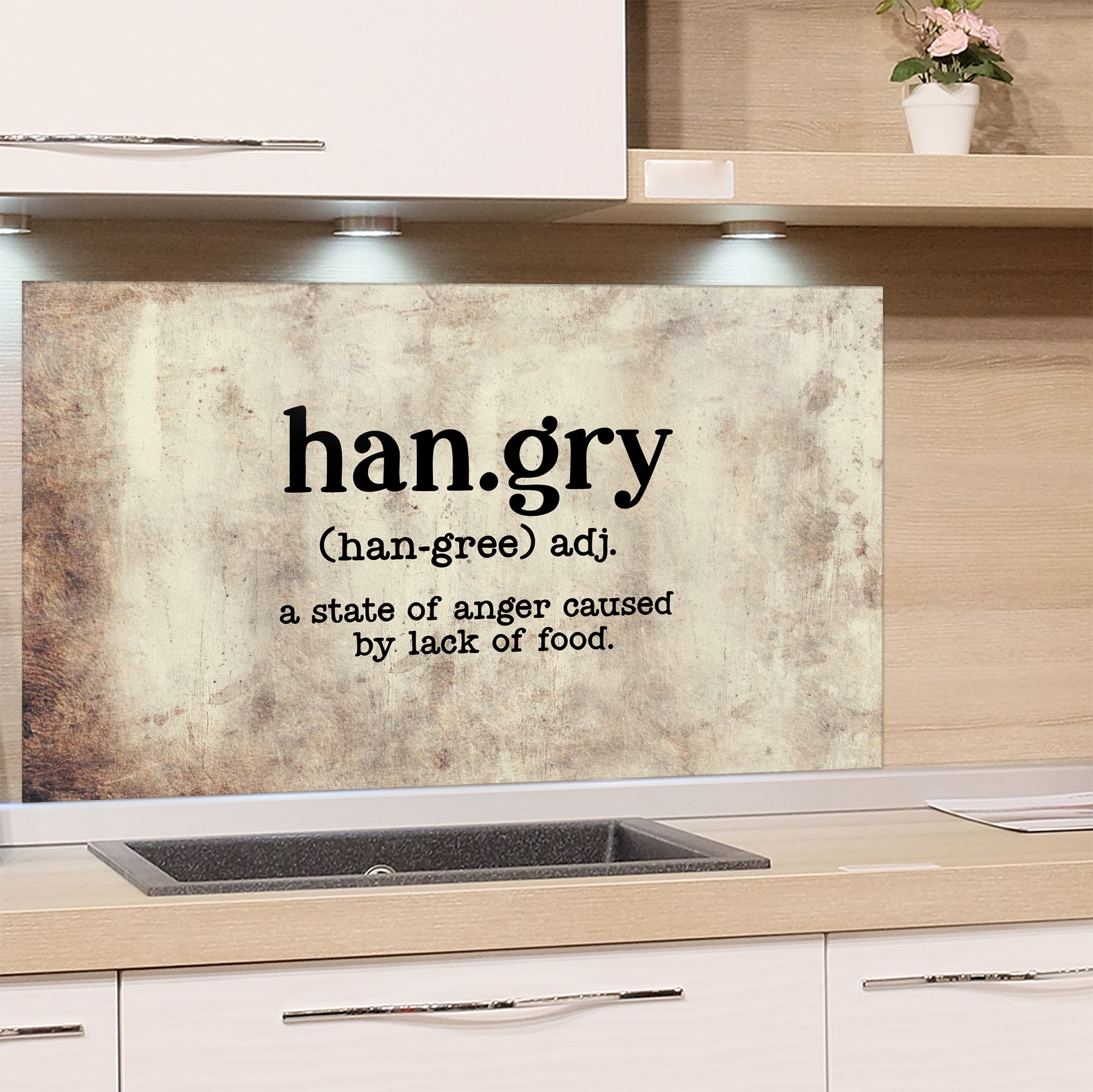 Glas-Spritzschutz mit Schriftzug hangry und Erklärung in Englisch