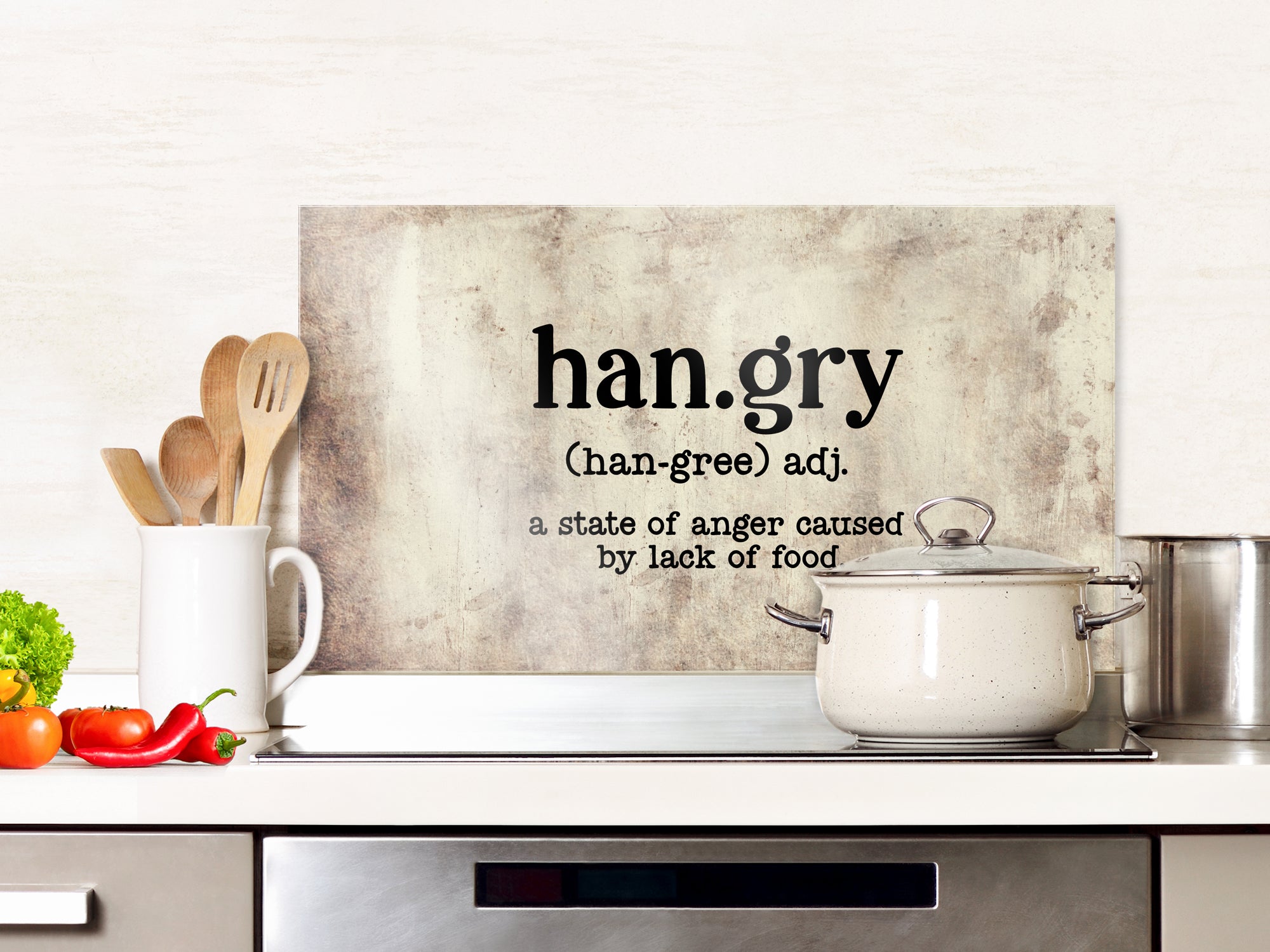 Detailansicht des Glas-Spritzschutzes mit Schriftzug hangry