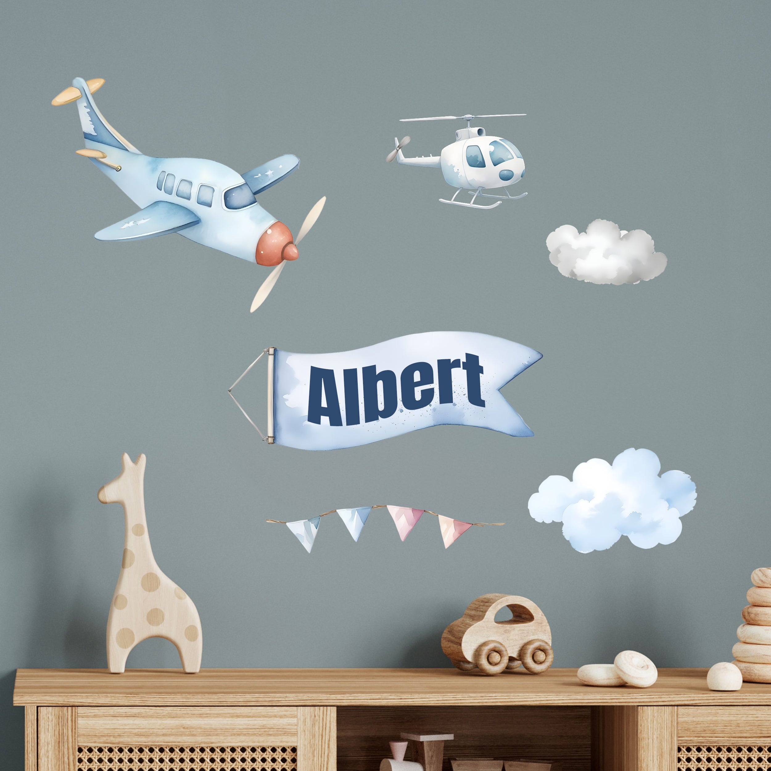 Blaue Flugzeuge, Wolken und Banner mit dem Namen Albert.