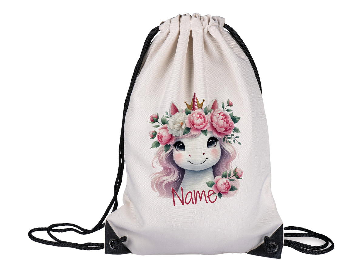 Weißer Turnbeutel mit Einhorn und Blumenmotiv.