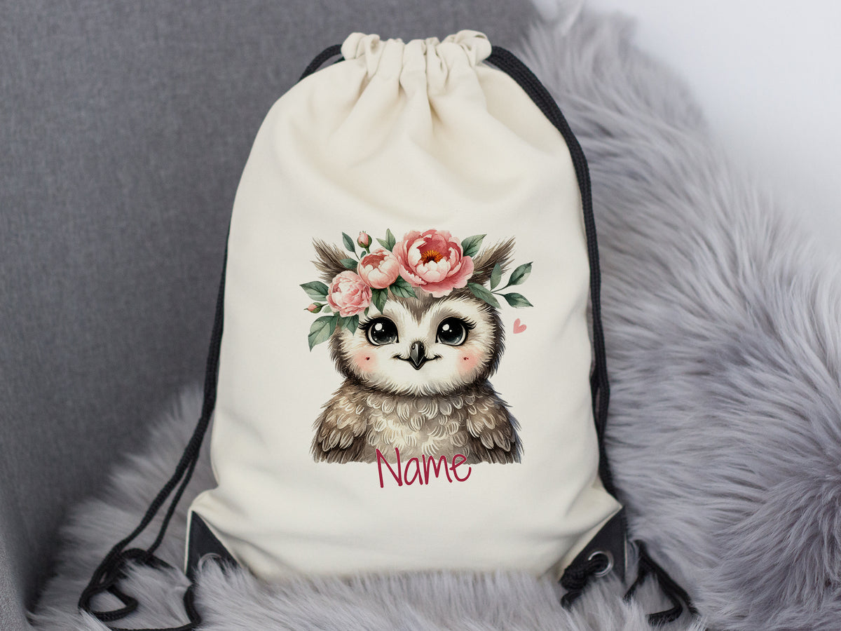 Beige Rucksack mit süßer Eule und Blumenkranz.