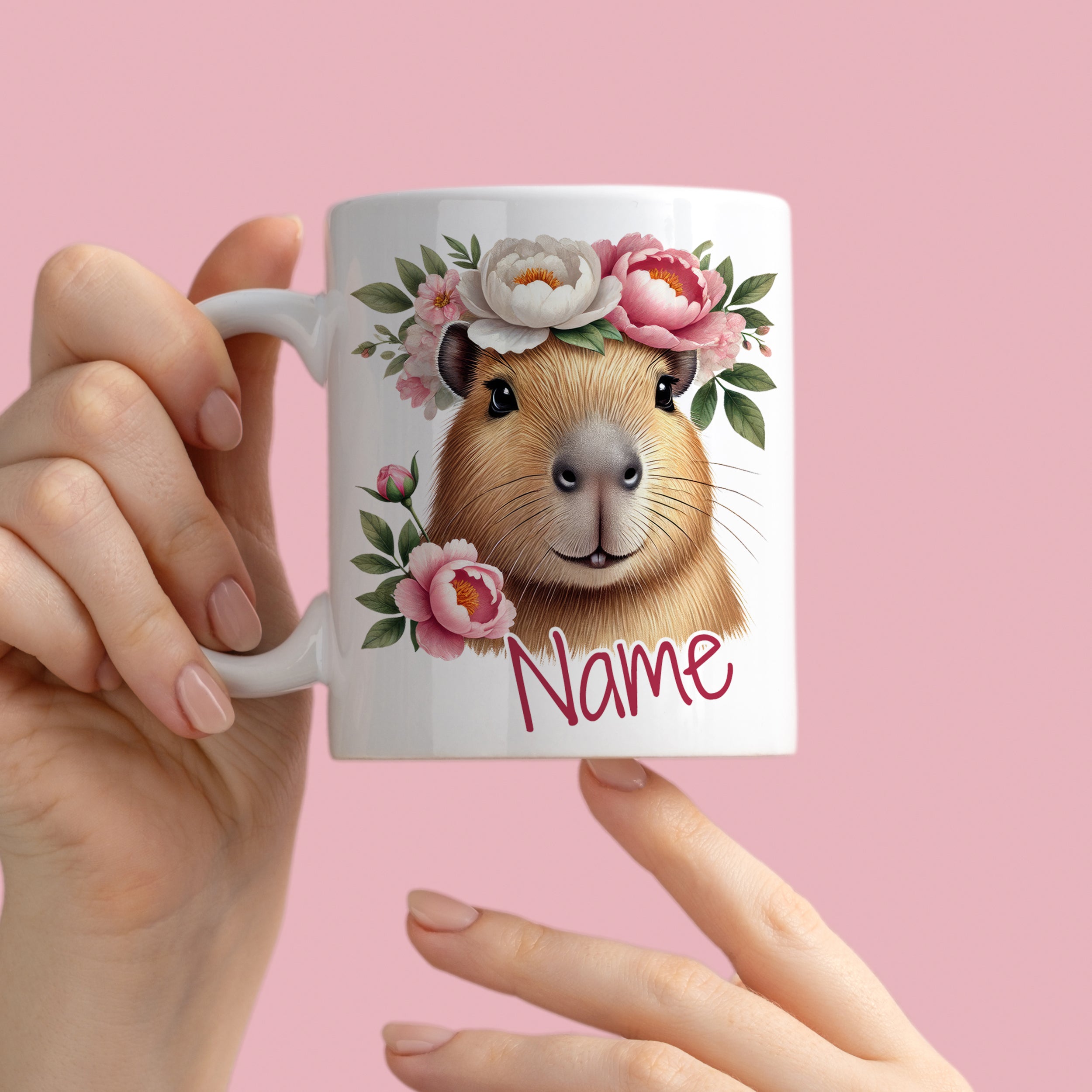 Tasse mit Capybara-Illustration und Blumenkranz.