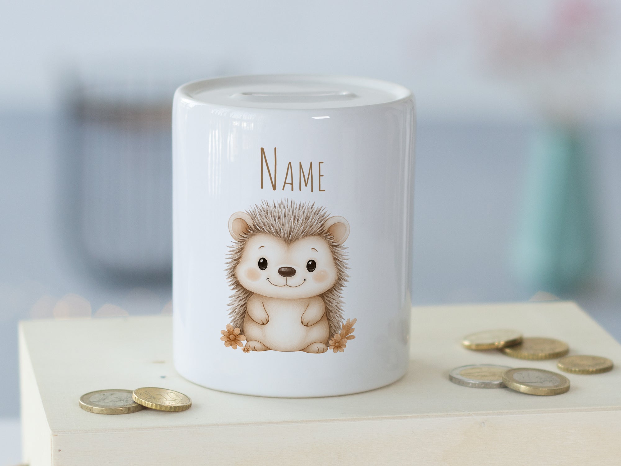 Sparschwein mit Igel-Motiv und personalisierbarem Namen.