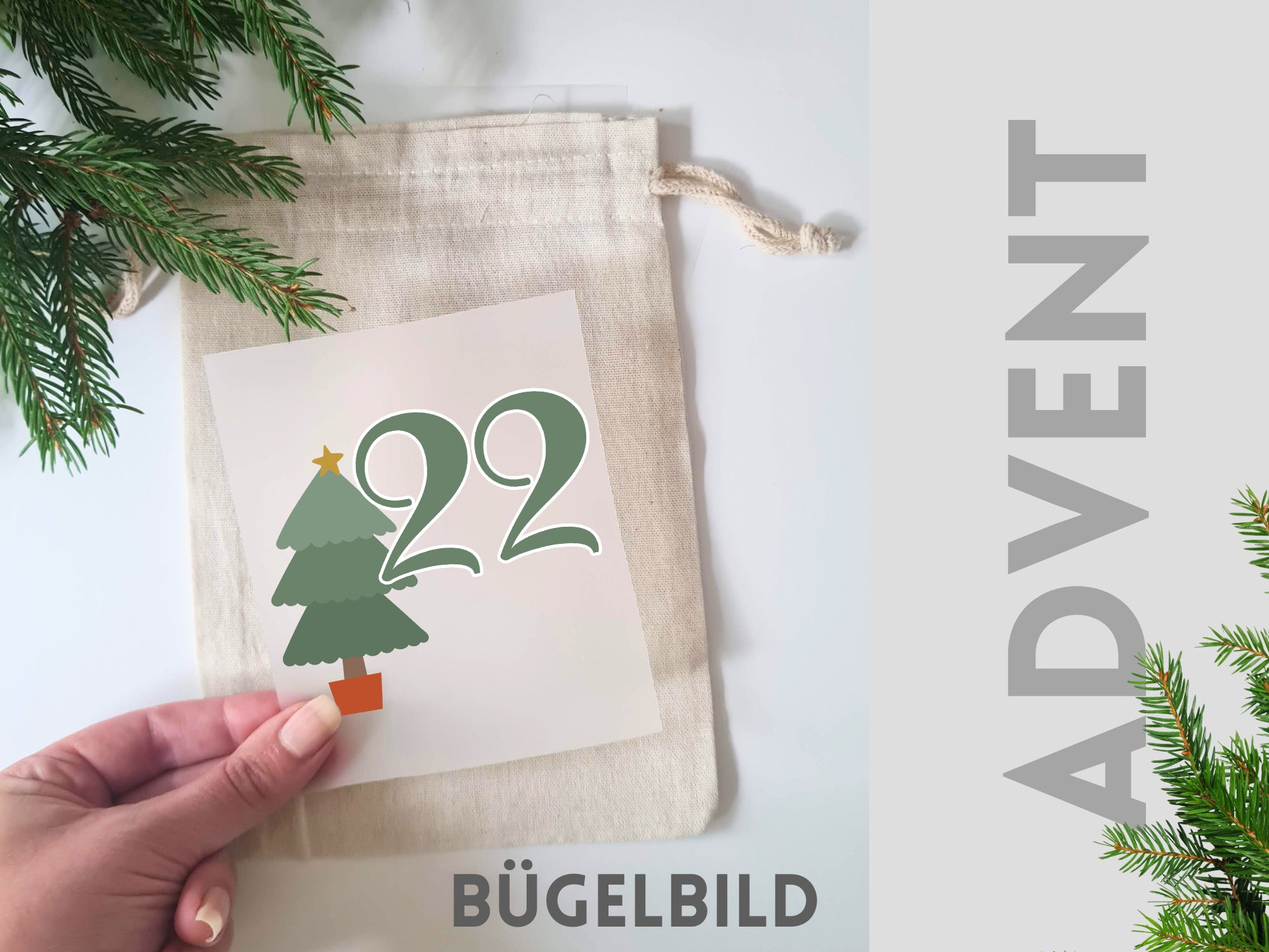 Bügelbild mit Weihnachtsbaum und der Zahl 22 in Grün.