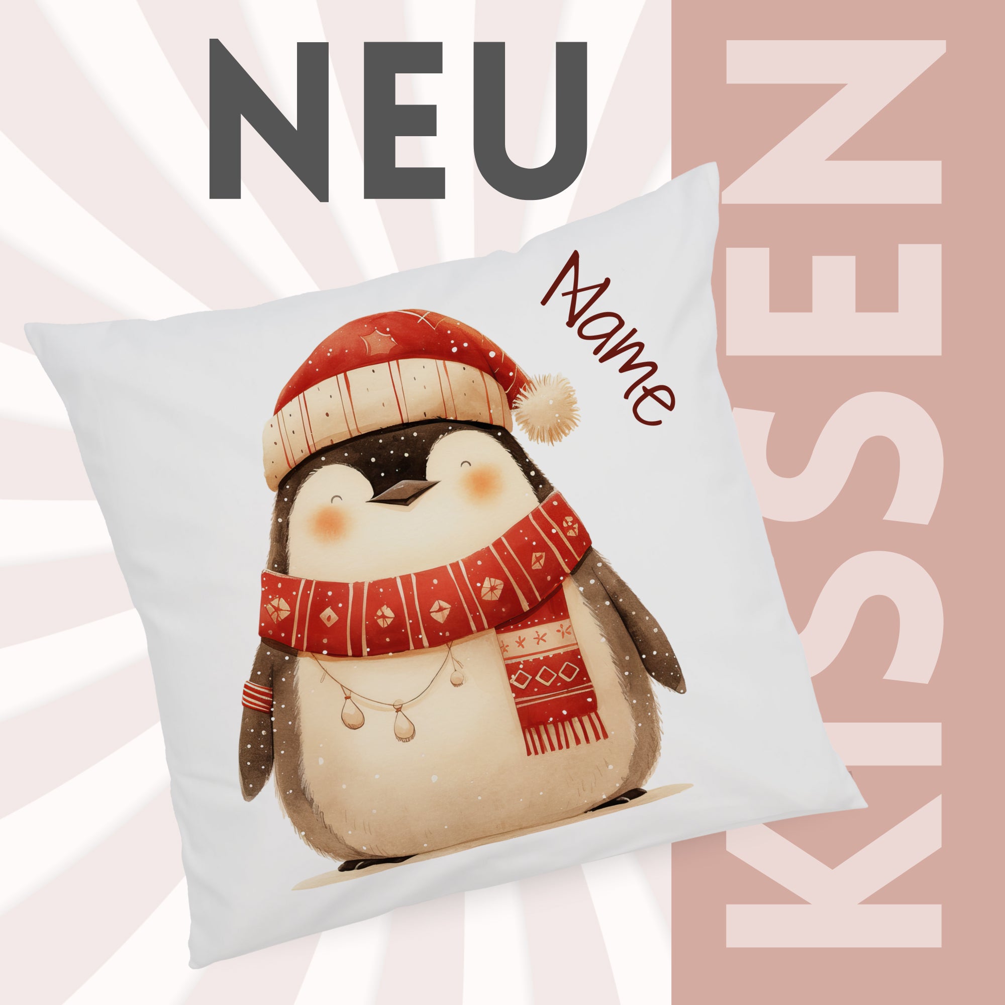 Kissen mit niedlichem Pinguin-Motiv und rotem Schal.