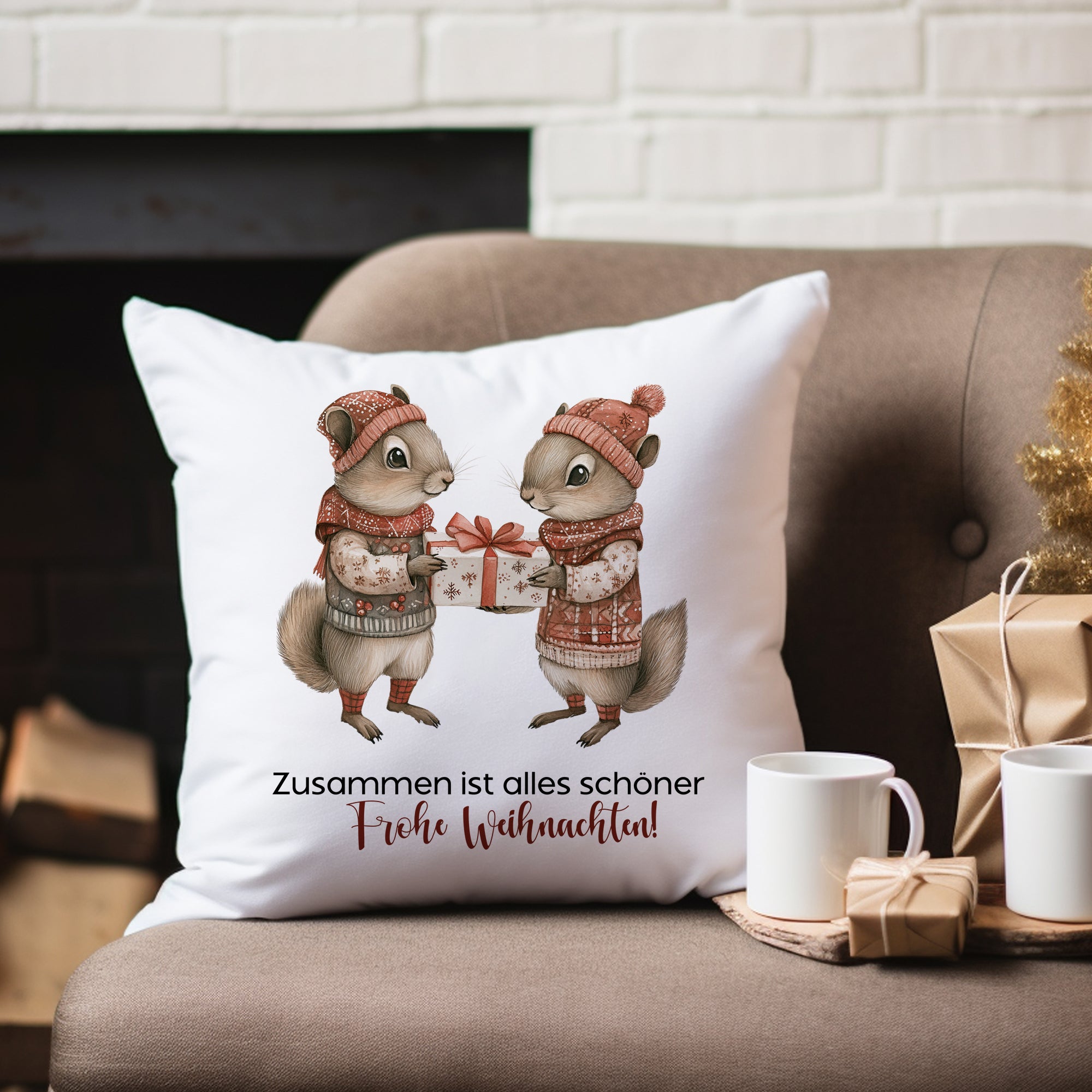 Kissen mit zwei Eichhörnchen und Weihnachtsbotschaft.