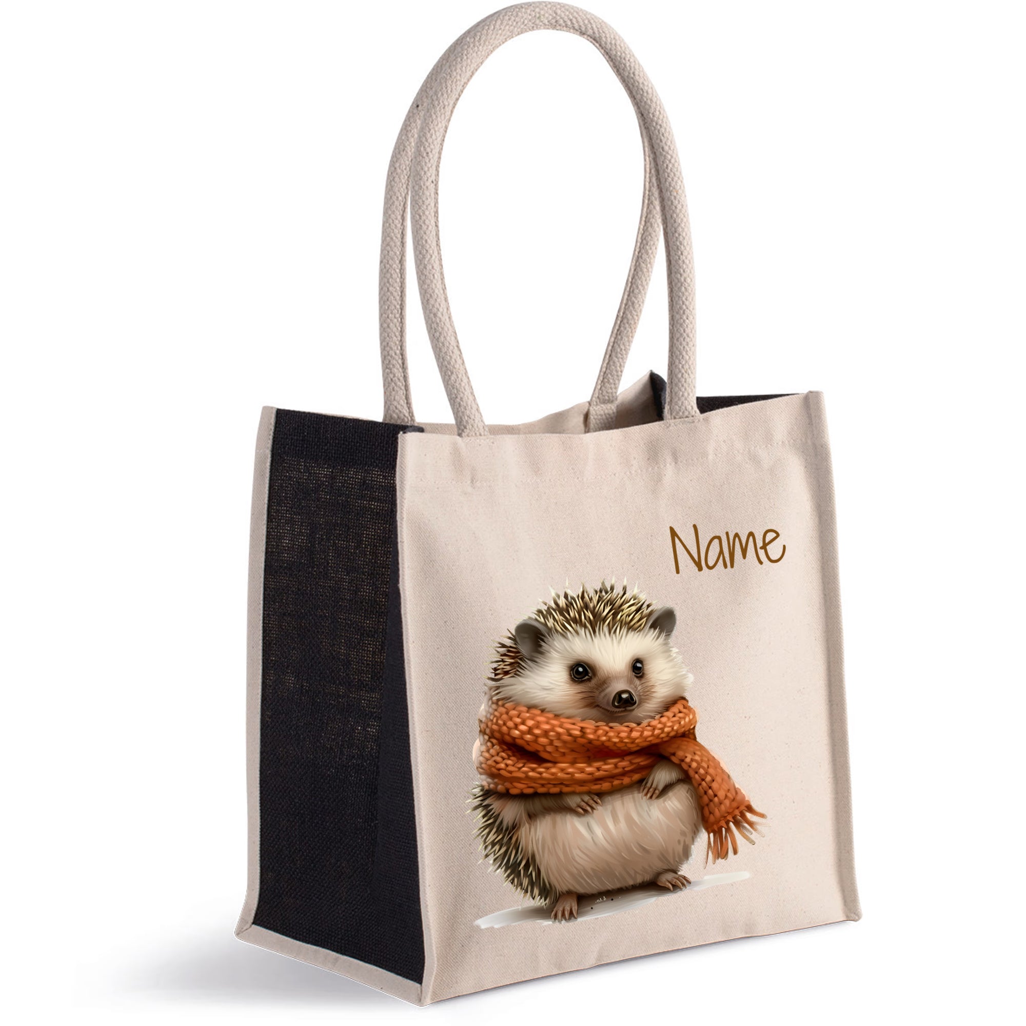 Beige Tasche mit Igel-Motiv und orangefarbener Schal.