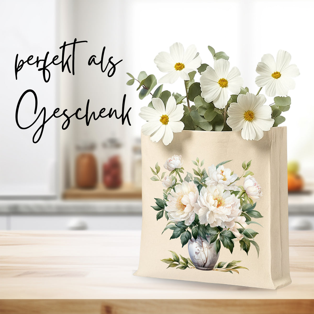 Beige Geschenkverpackung mit weißen Blumen und grünen Blättern.