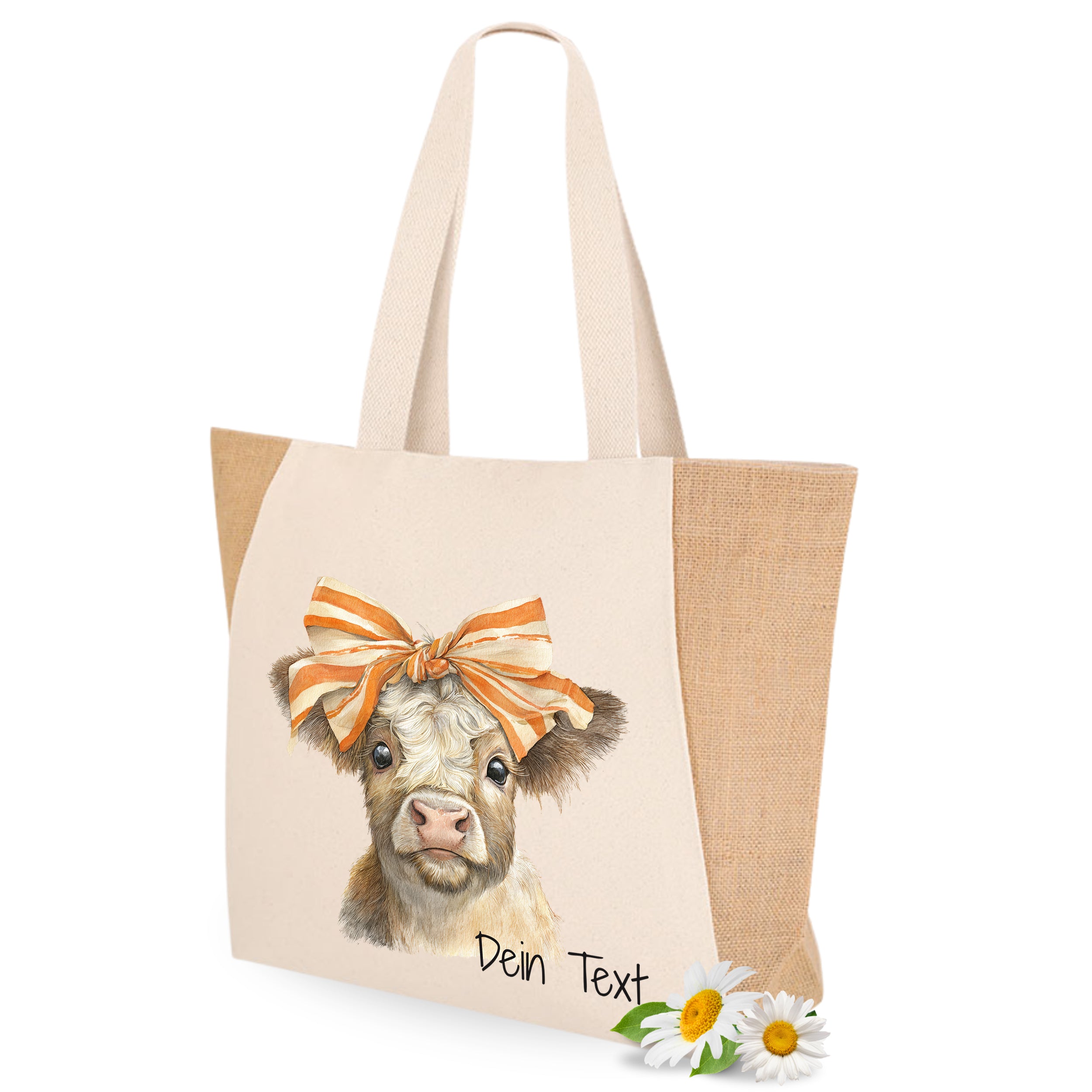 Stofftasche mit Kuhmotiv und orangefarbenem Haarband.