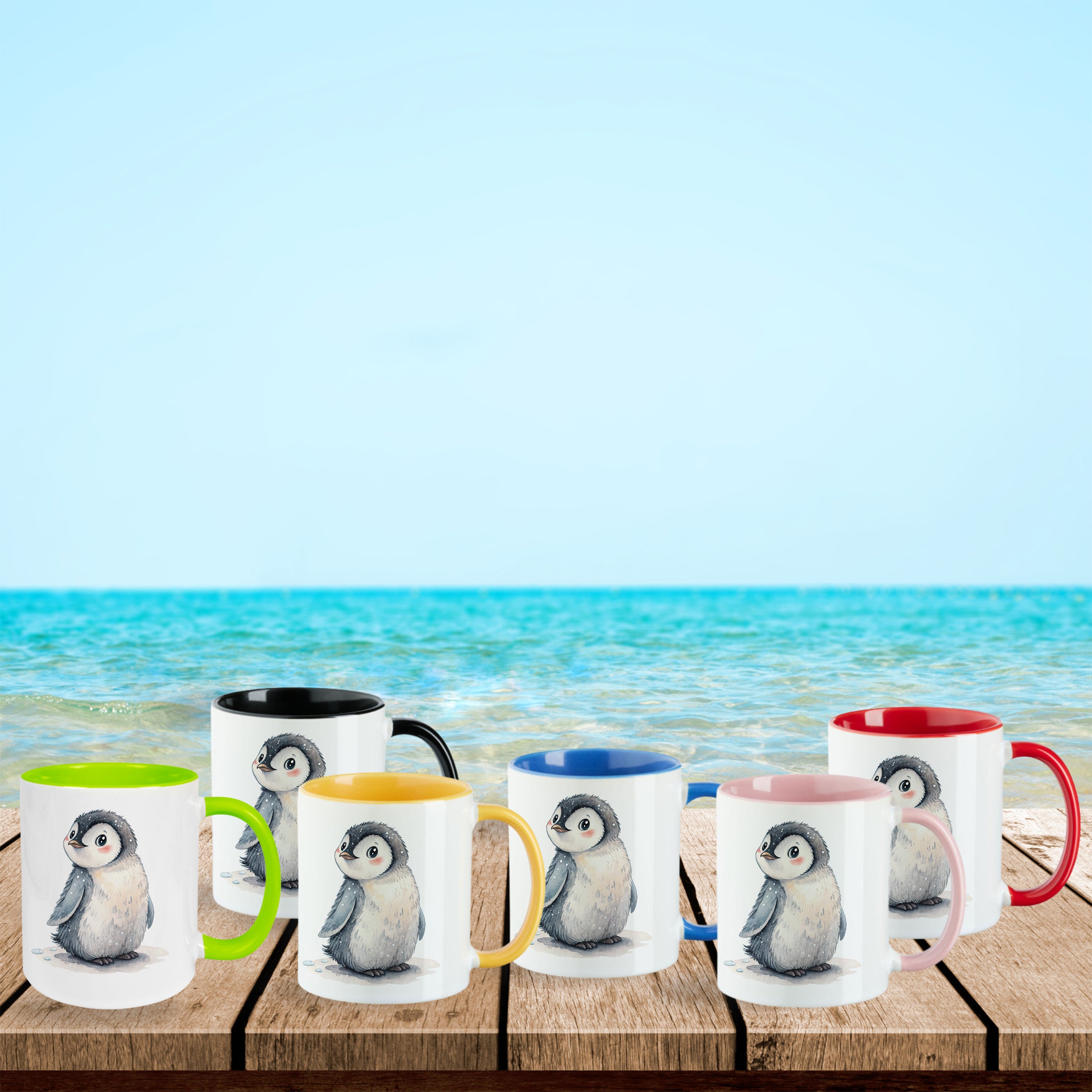 Tassen mit Pinguin-Motiv in verschiedenen Farben.