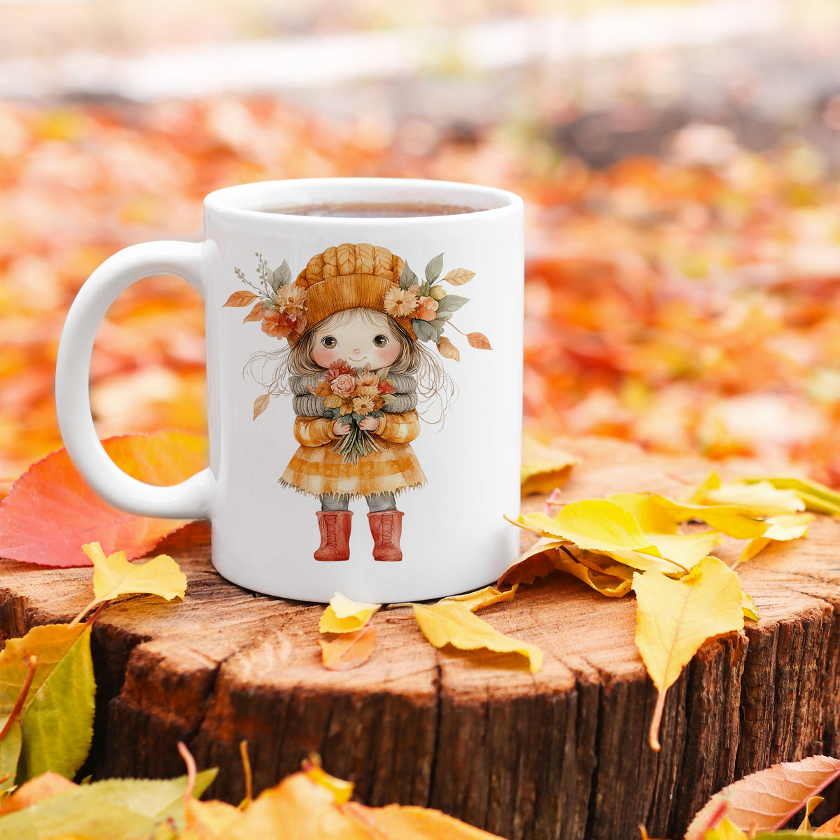 Tasse mit illustrativer Herbstfigur und bunten Blumen.
