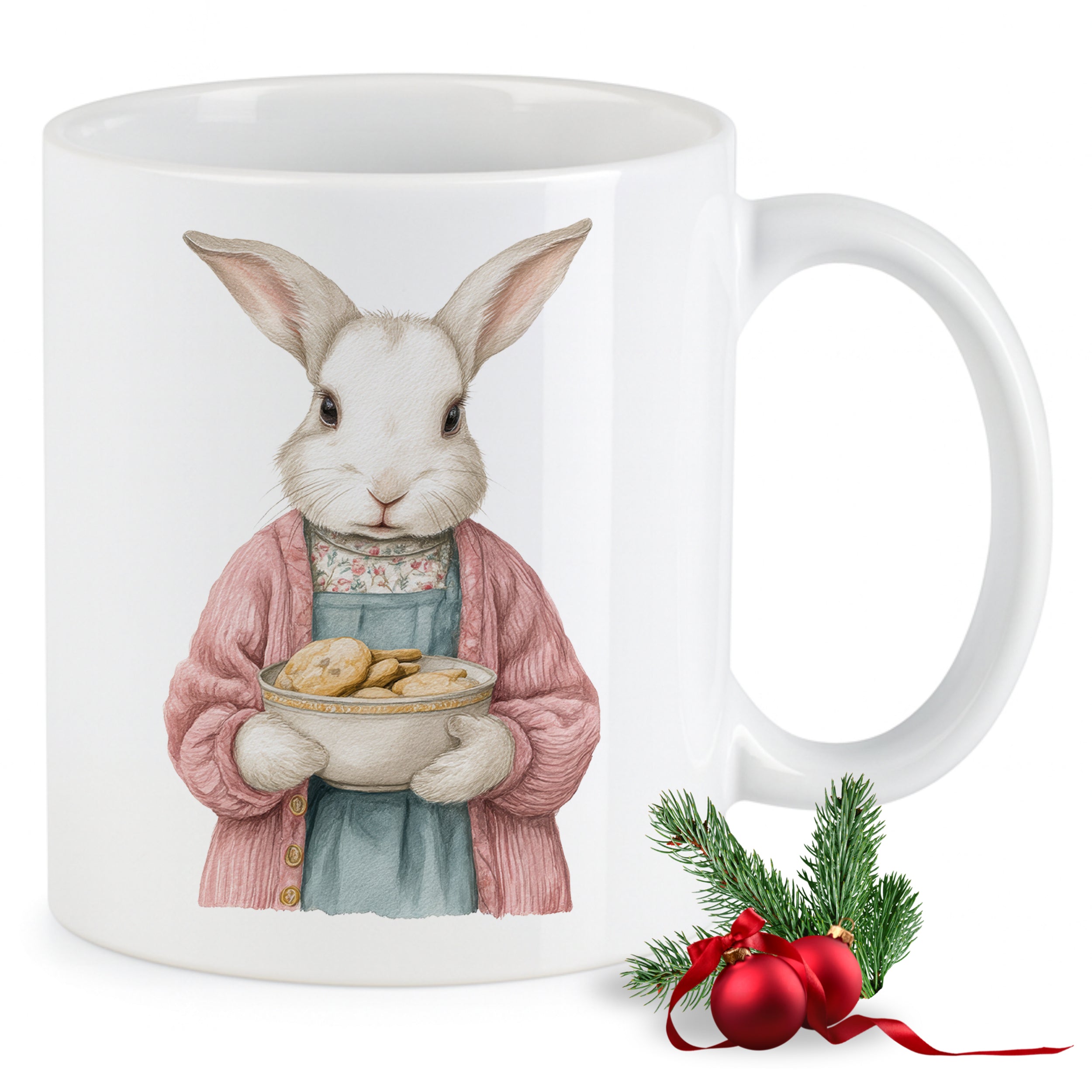Weißer Becher mit Hasenmotiv und Keksschüssel.
