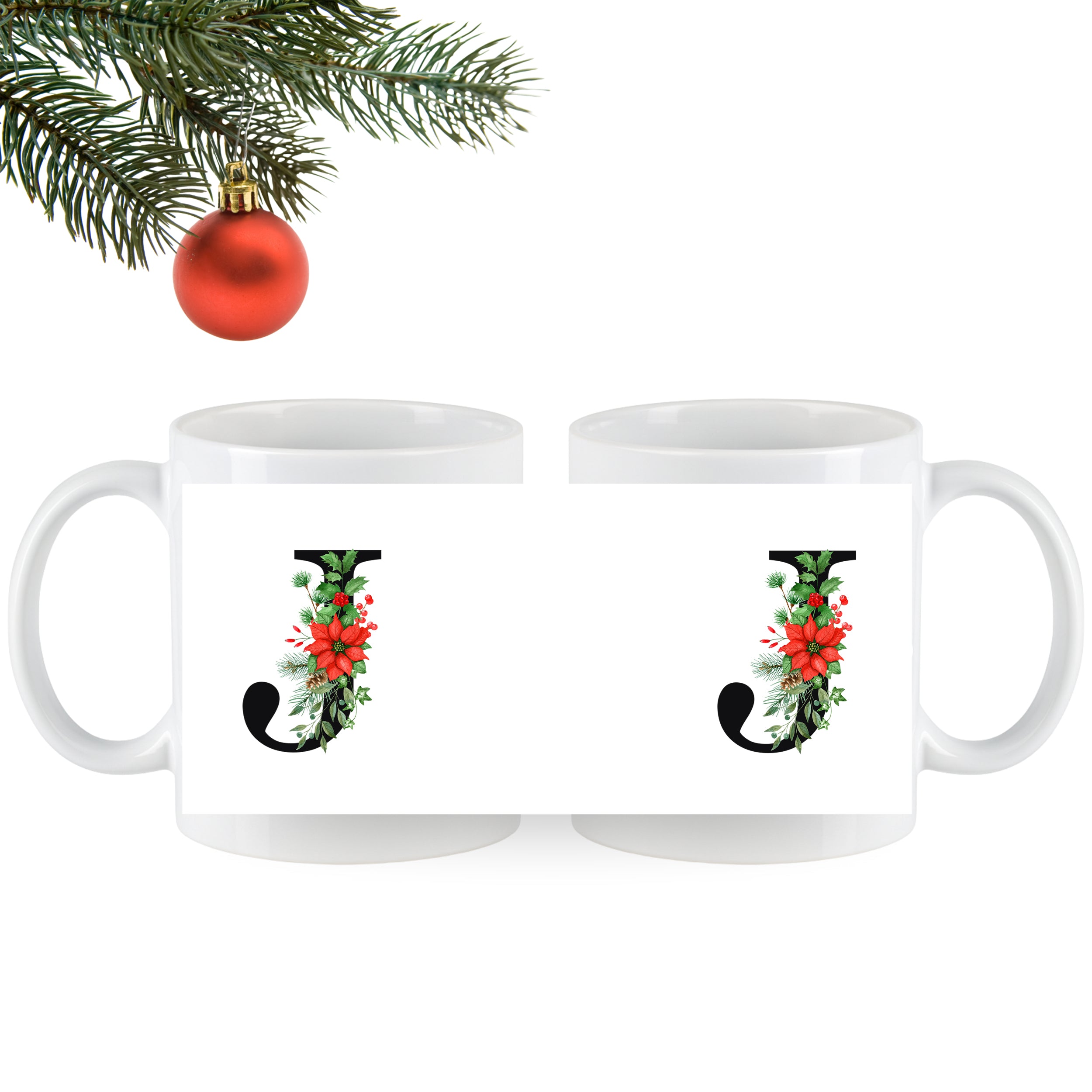 Weiße Tassen mit grünen und roten Weihnachtsmotiven.