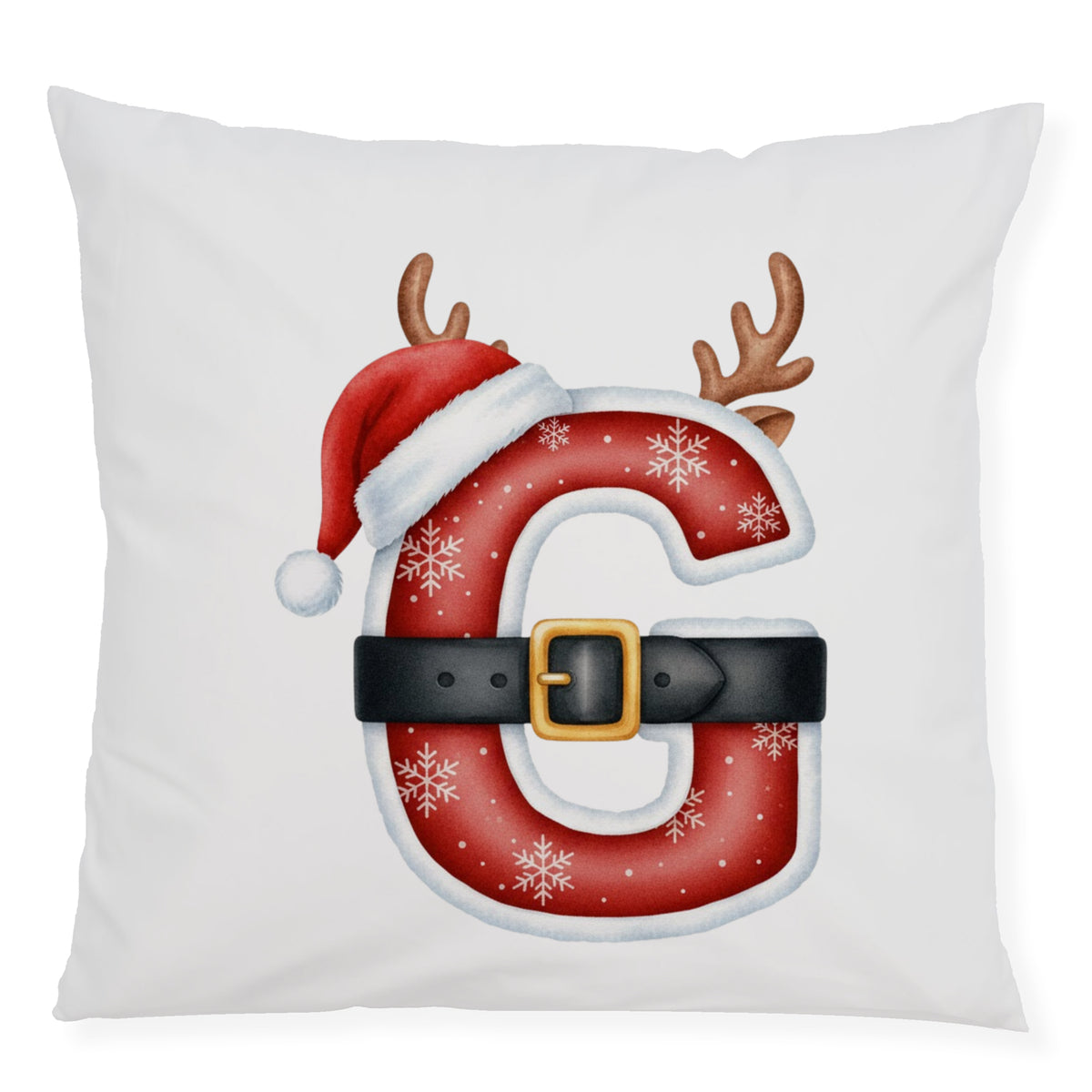 Weihnachtliches Kissen mit rotem 'G', Weihnachtsmannmütze und Geweih.