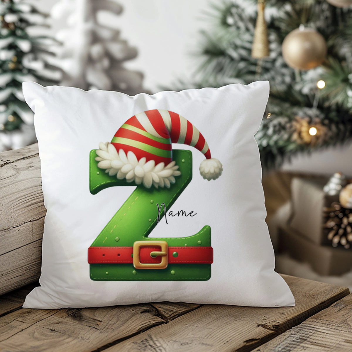 Grüner Kissenbezug mit Weihnachtsmotiv und der Zahl 2.