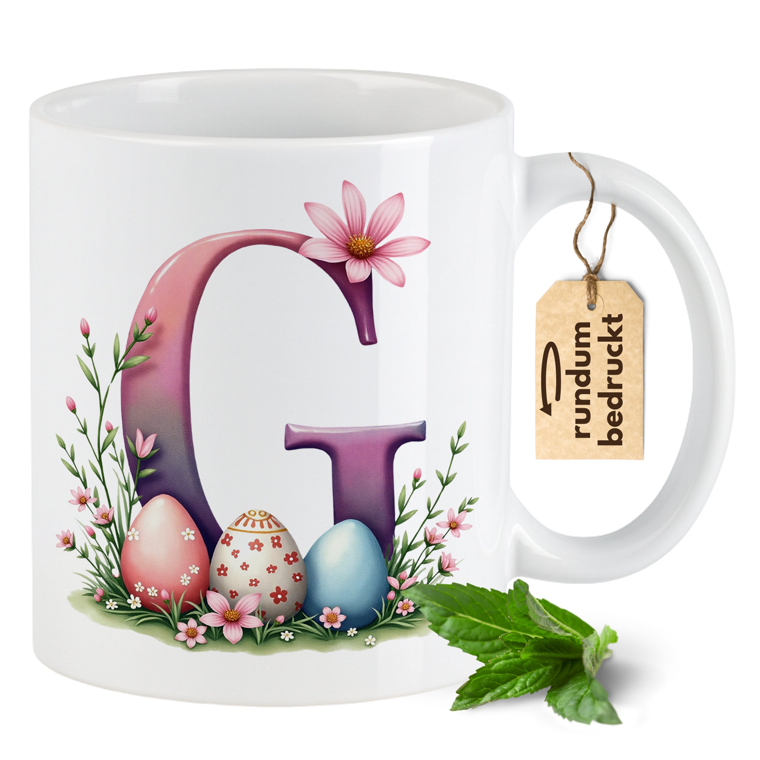 Tasse mit buntem Buchstaben G, Ostereiern und Blumen.