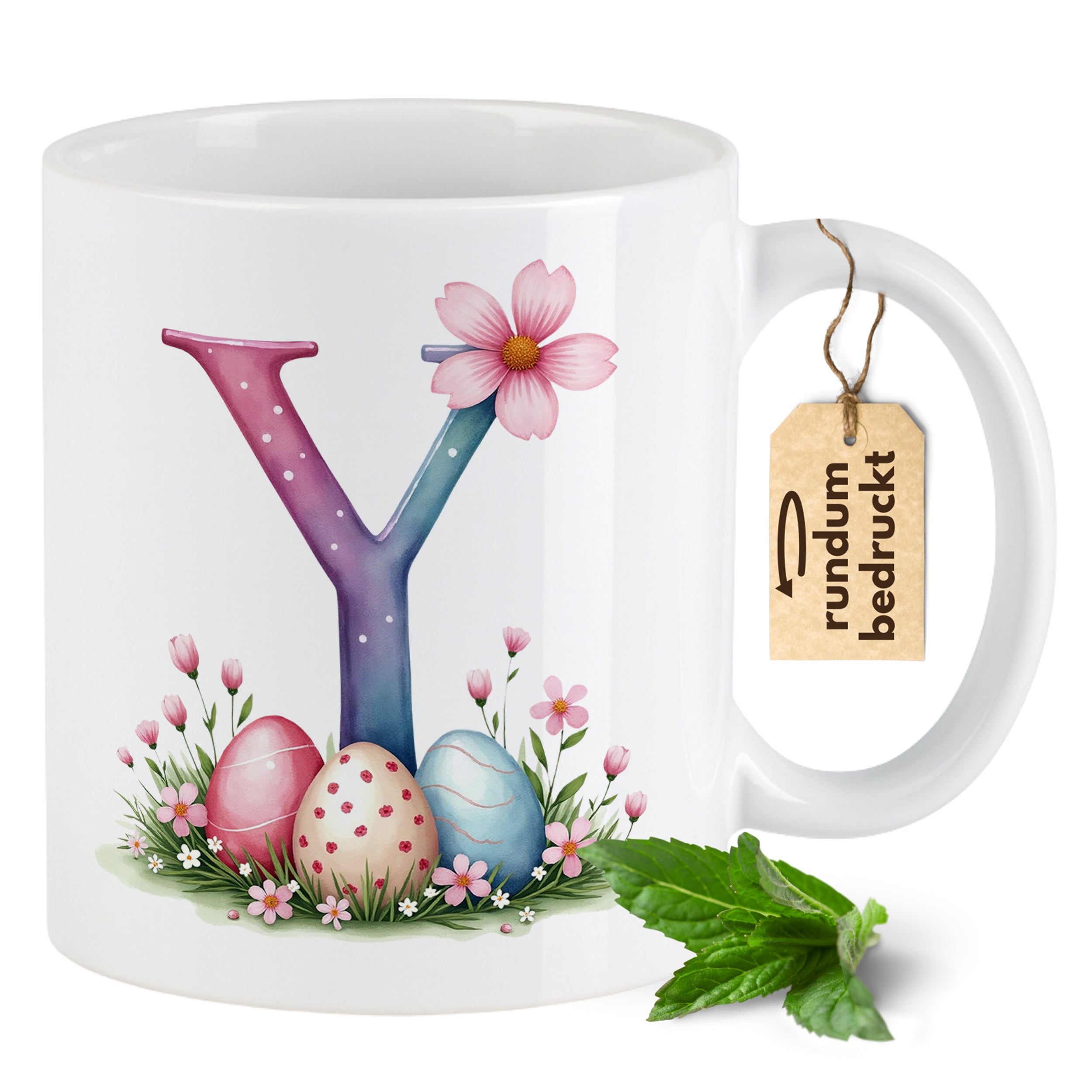 Tasse mit buntem Buchstaben Y, Blumen und Ostereiern.