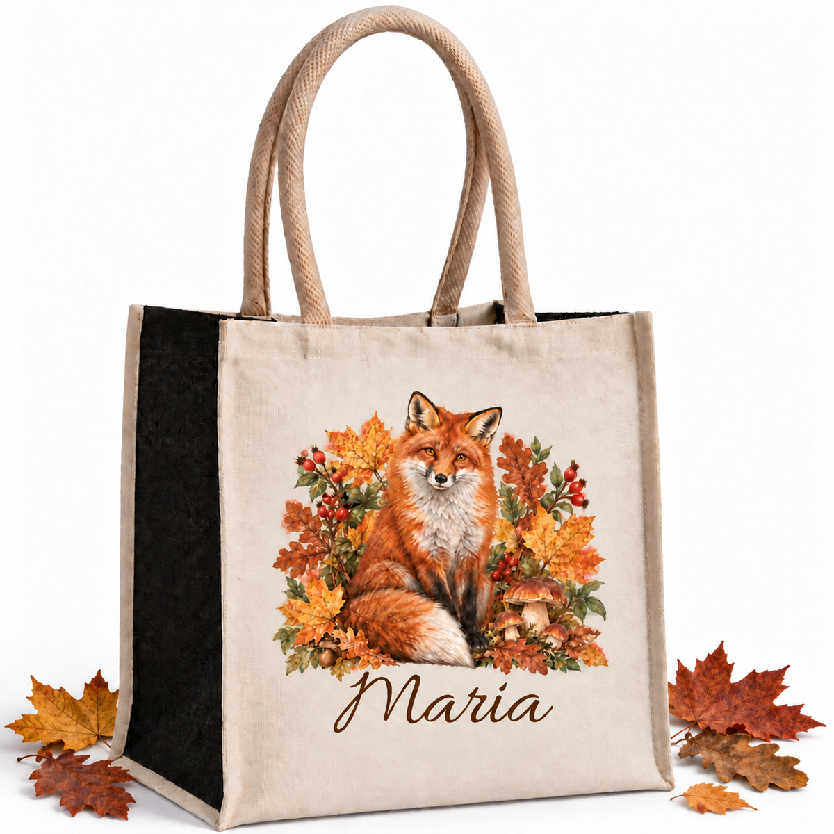 Einkaufstasche mit herbstlichem Fuchs-Motiv und Wunschname mit herbstlichen Blättern als Dekoration auf weißem Hintergrund.