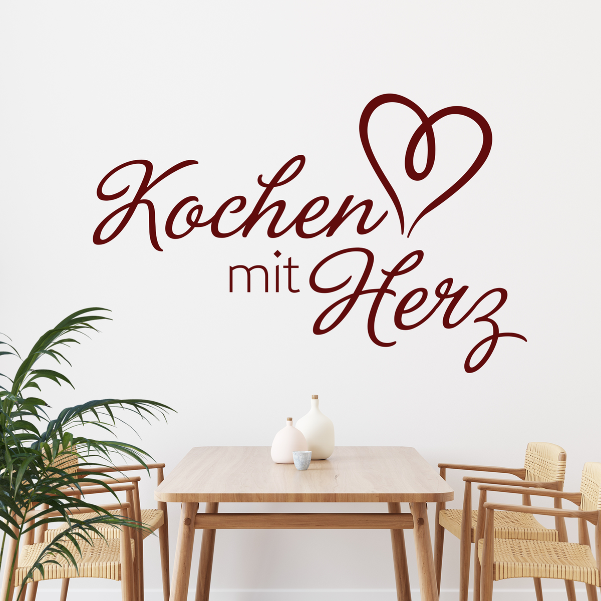 Wandtattoo "Kochen mit Herz" in Rot.