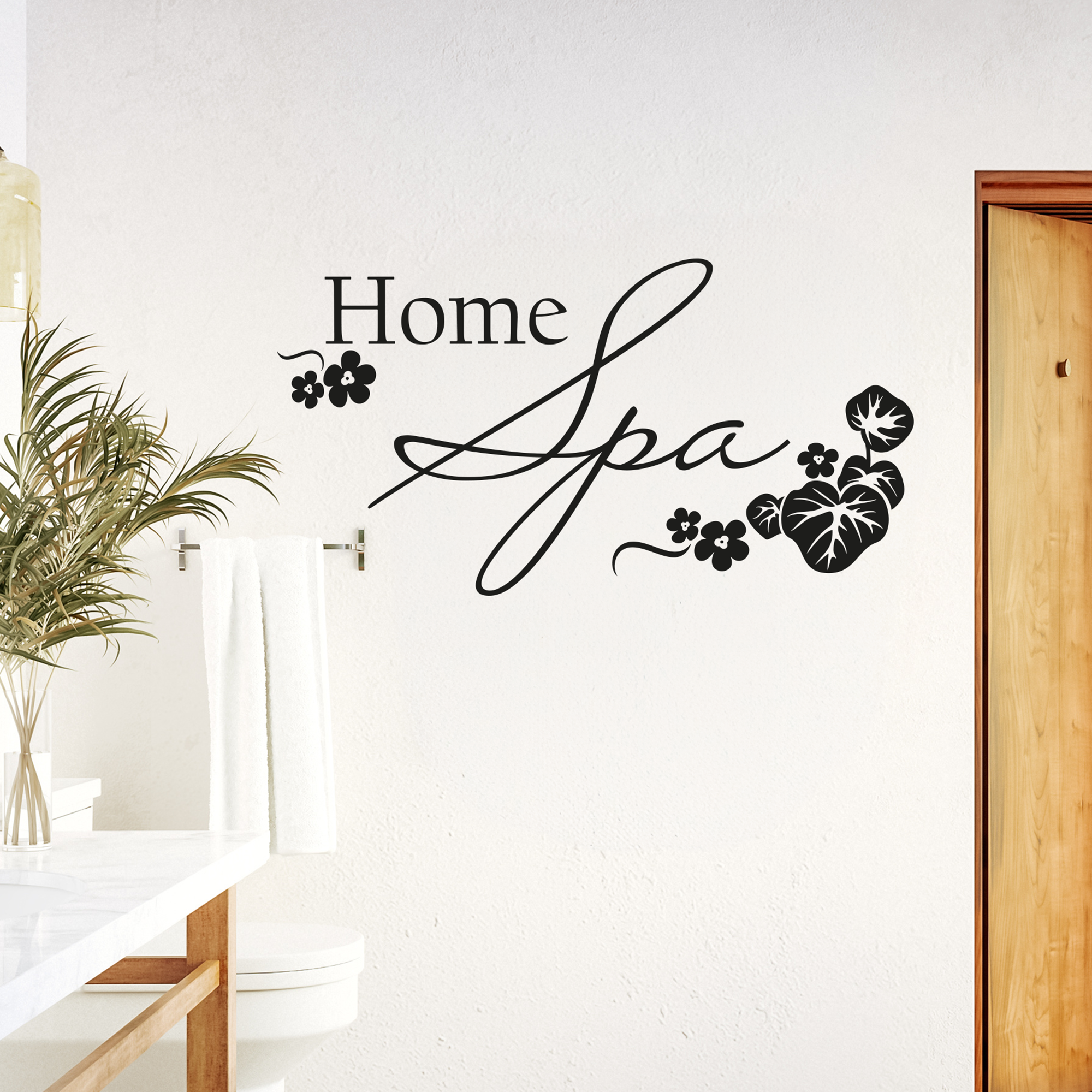 Schwarzer Wandaufkleber "Home Spa" mit Pflanzenmotiven.