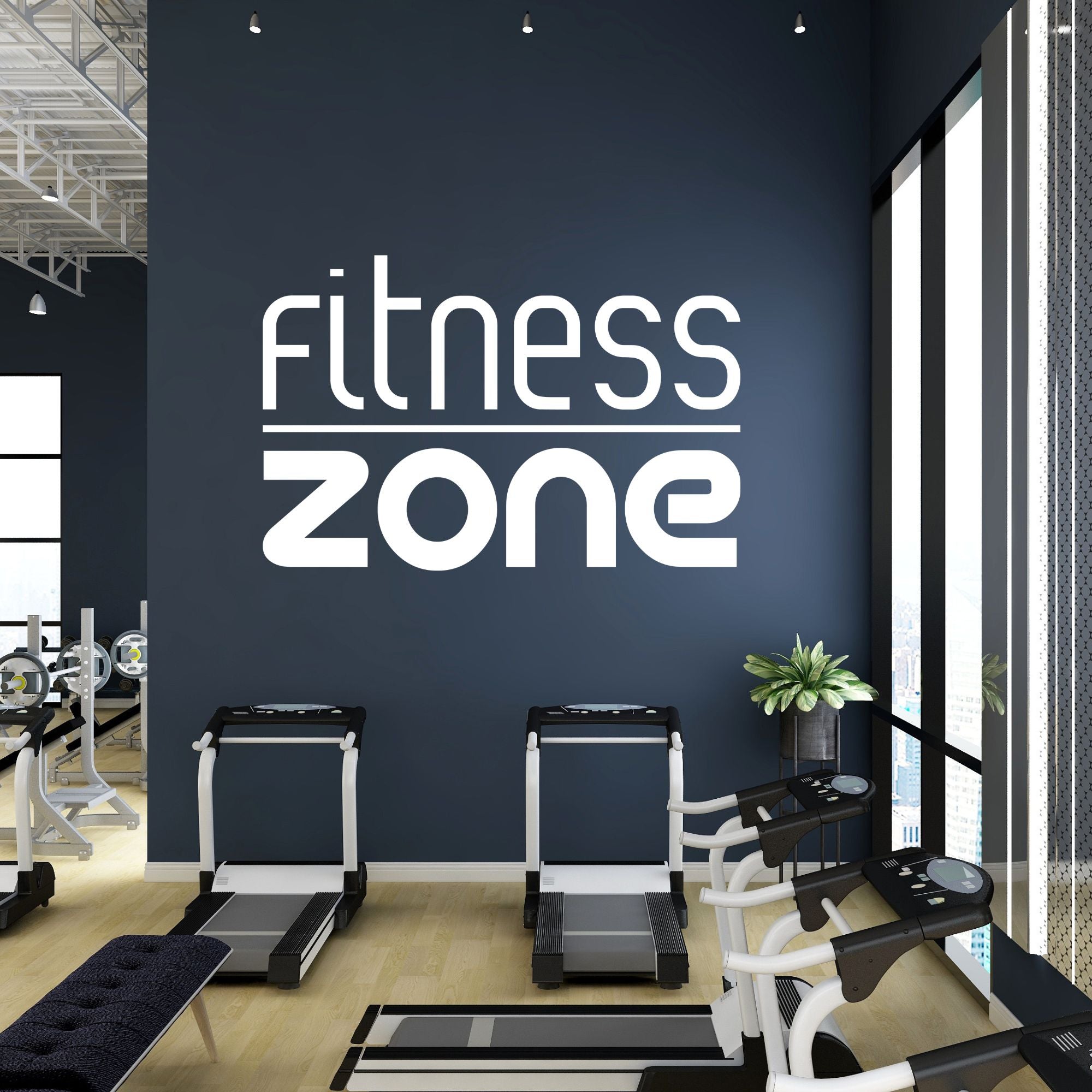 Fitness Zone Wandbeschriftung in weiß auf dunklem Hintergrund.