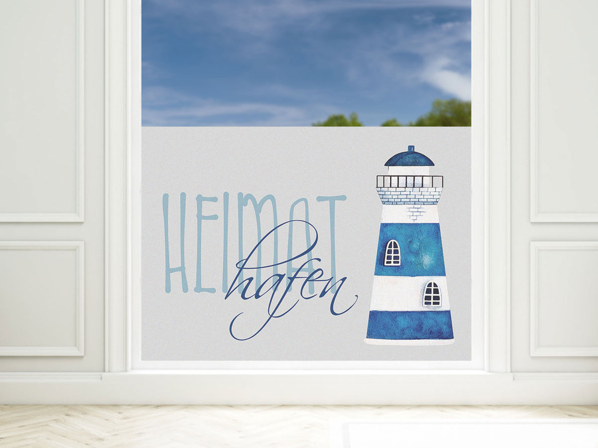Blauer Leuchtturm mit Schriftzug "Heimat Hafen"