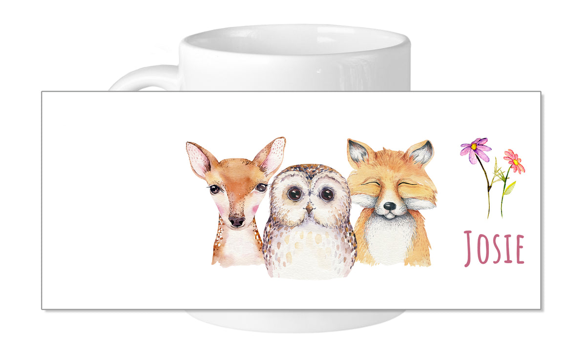 Tasse mit bunten Tierillustrationen und dem Namen "JOSIE".