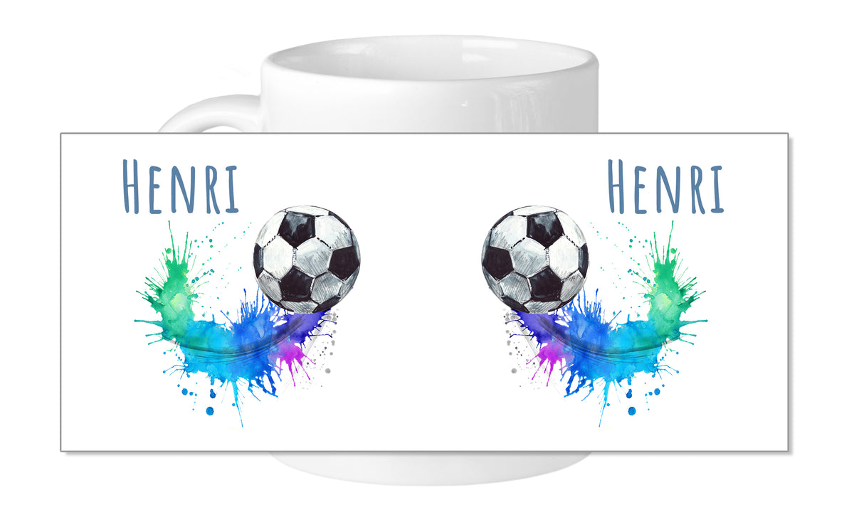 Tasse mit Fußballmotiv und bunten Farbklecksen, Name "Henri".