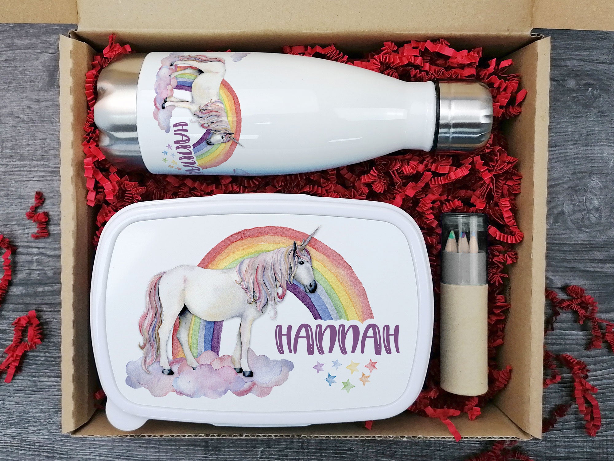 Einhorn-Geschenkset mit Trinkflasche und Brotdose.