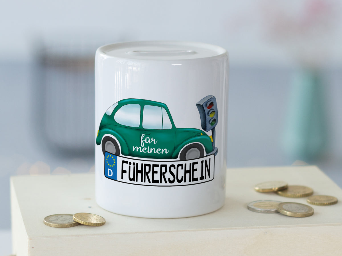 Grüne Spardose mit Auto und Aufschrift für meinen Führerschein.