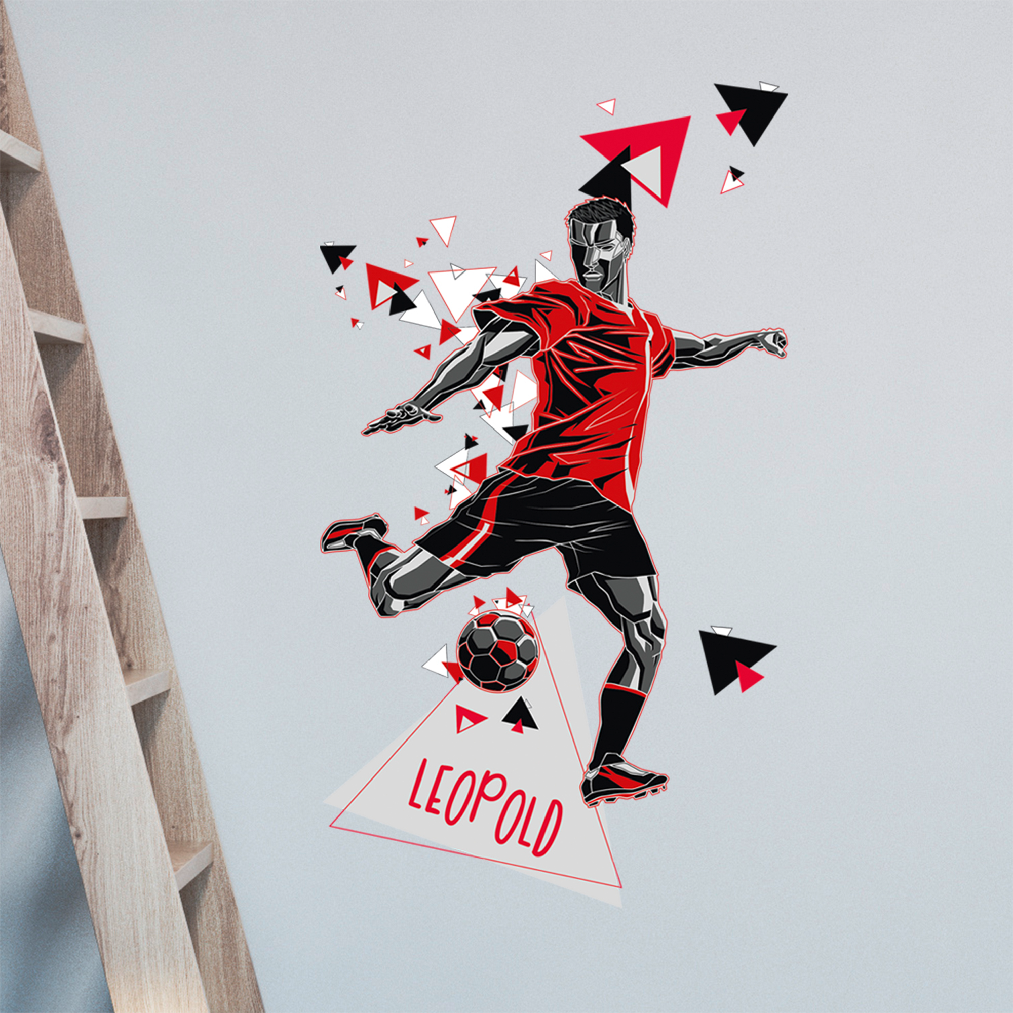 Fußballspieler in rotem Trikot, dynamisch mit Ball, grafische Elemente.