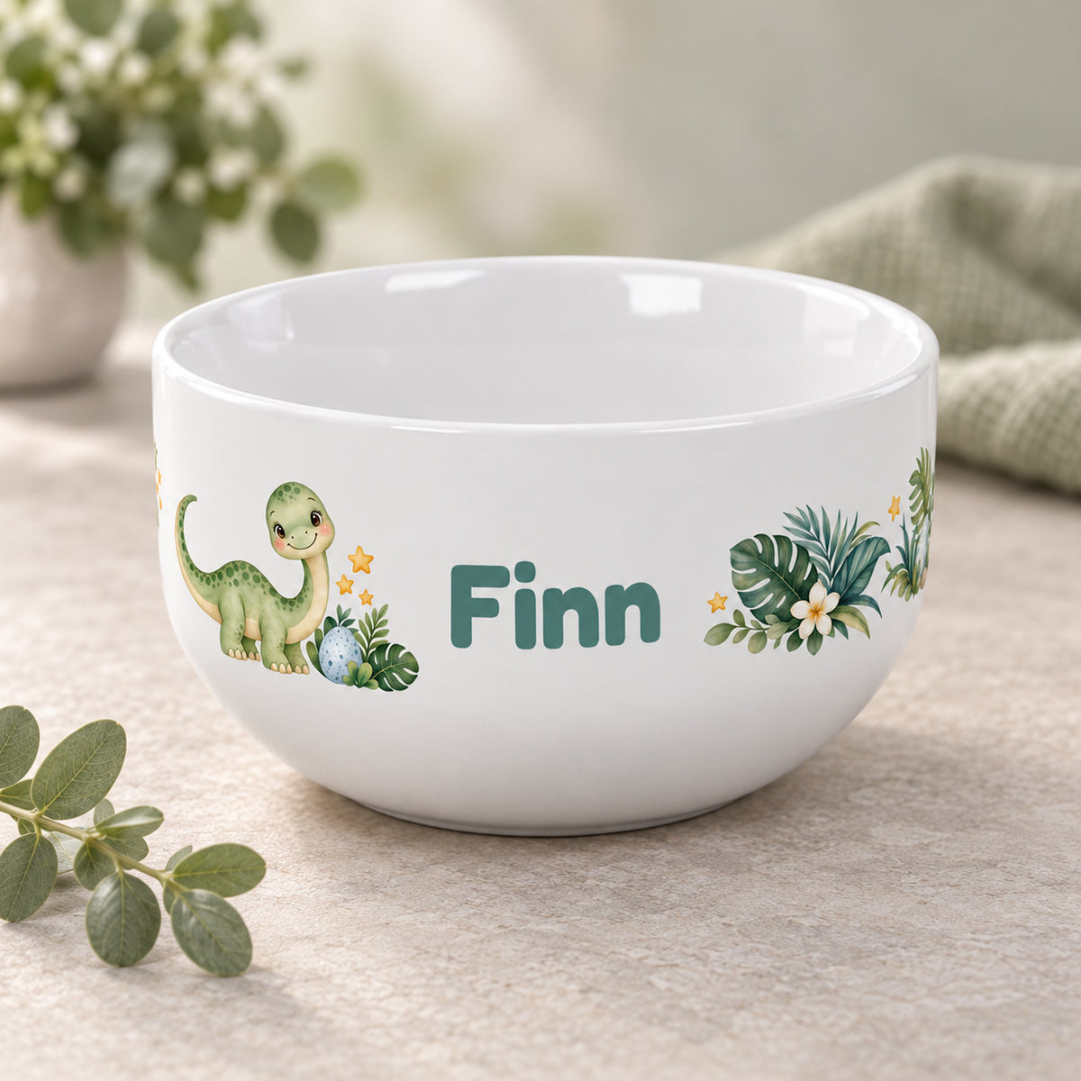 Schrägansicht der Müslischale Dino mit Beispielname Finn