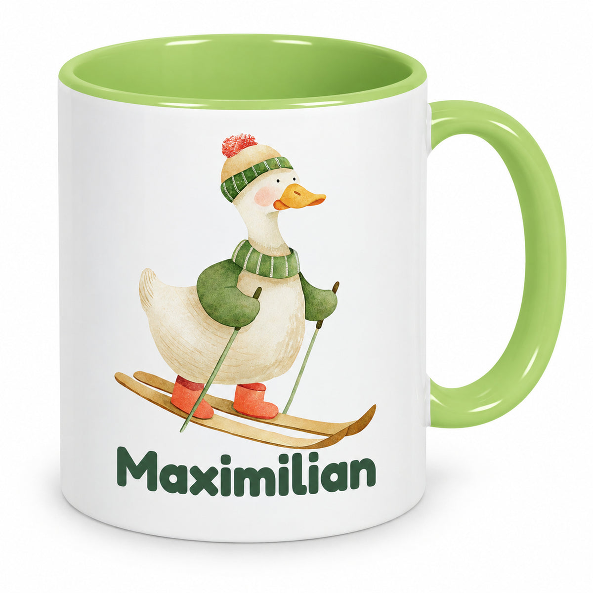 Hellgrüne Tasse mit Gans auf Skiern und Beispielname Maximilian in der Vorderansicht