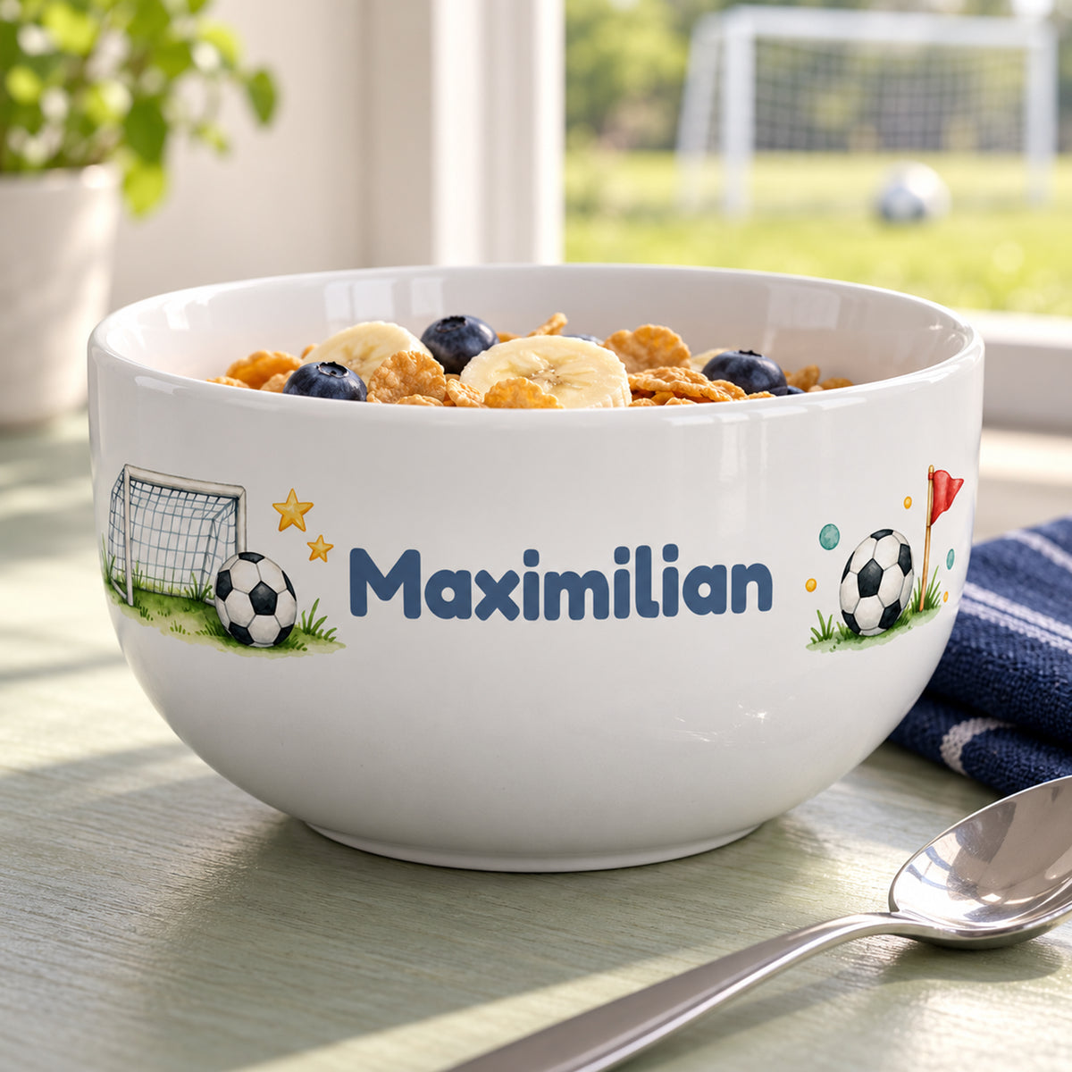 Motivansicht der Müslischale mit Tor und Ball, Sternen und Wunschname