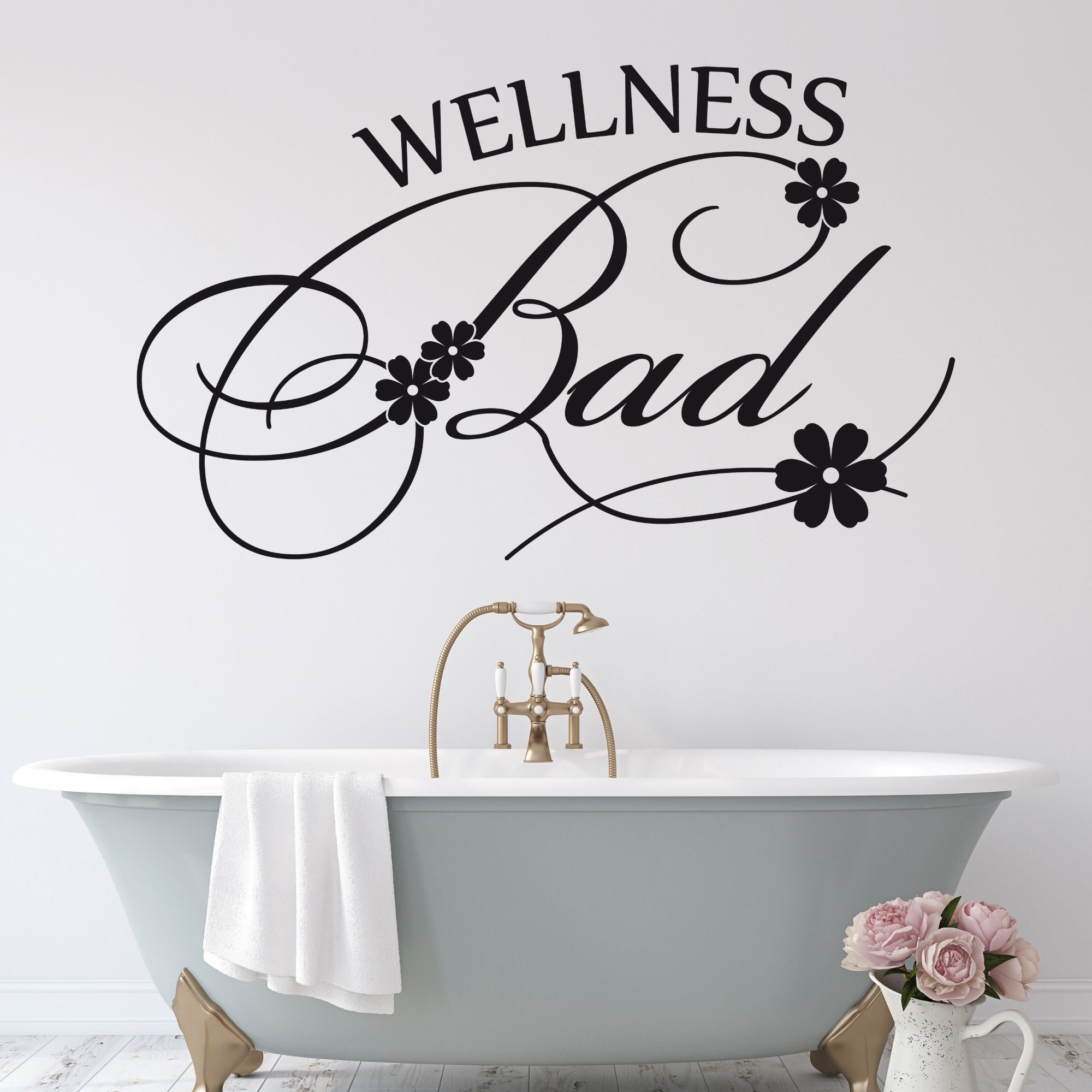 Wellness Bad Wandtattoo in Schwarz mit Blumenmotiven.