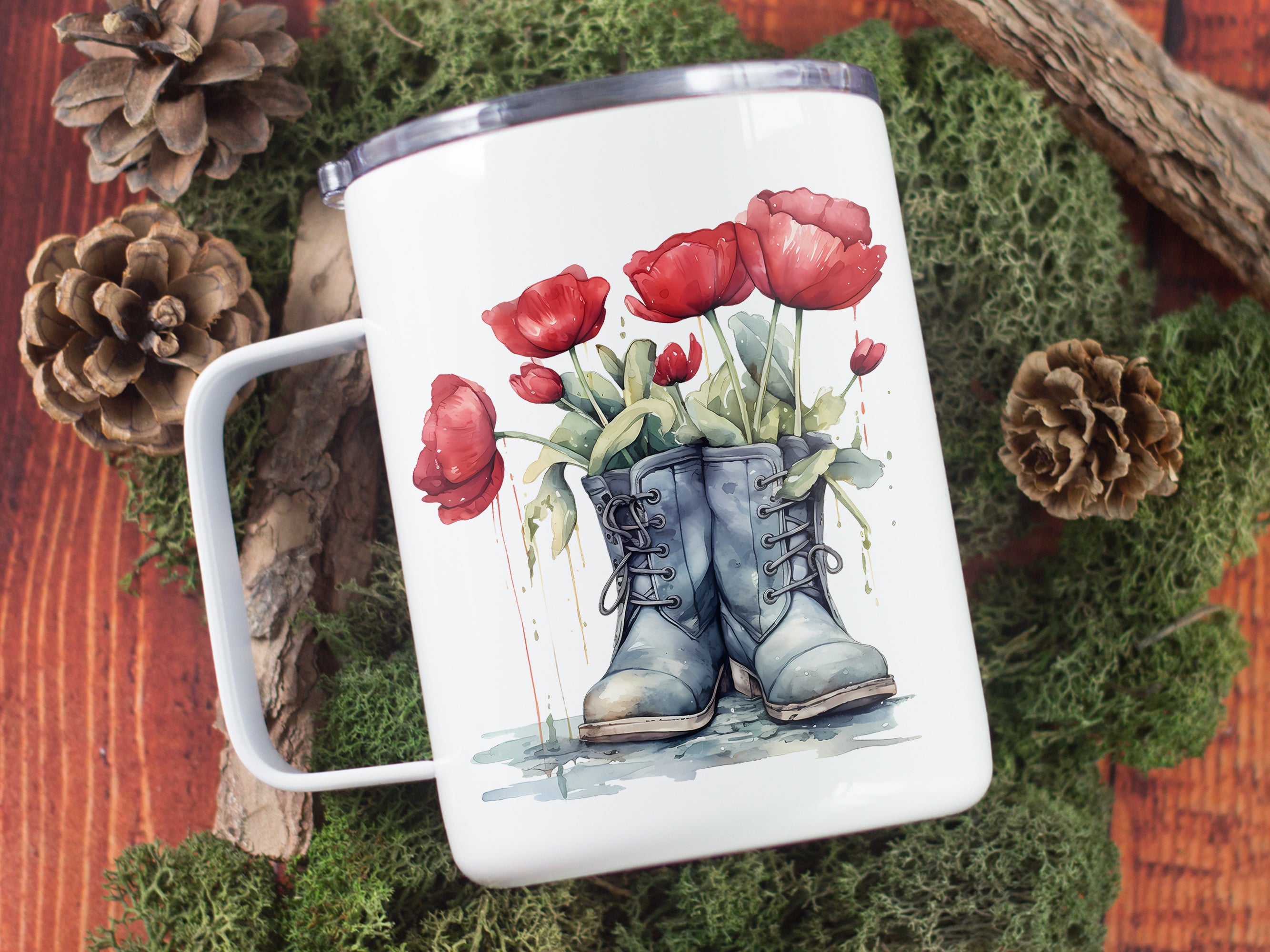 Tasse mit blauen Stiefeln und roten Tulpen.