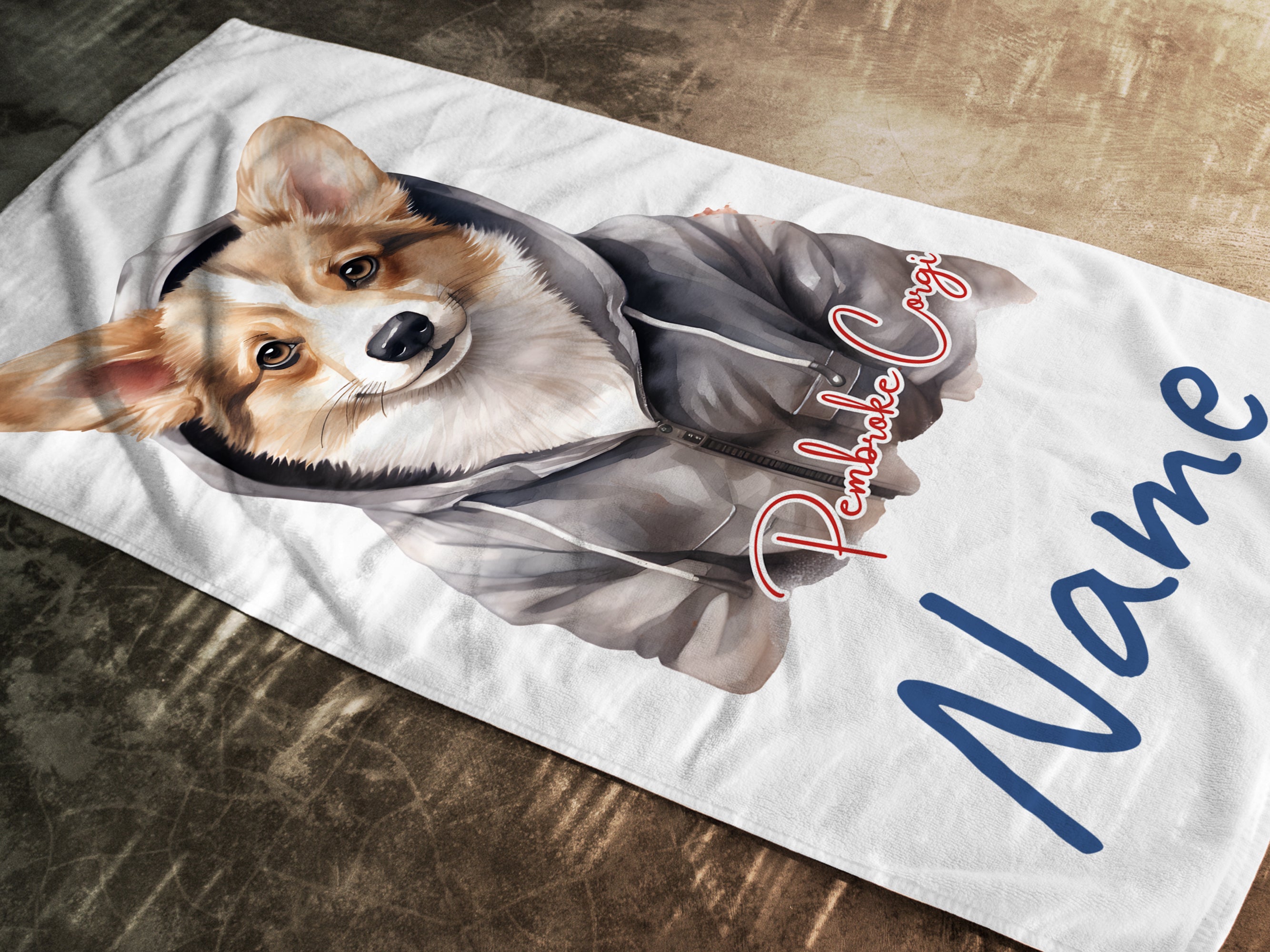 Corgi in Hoodie, weißes Handtuch, personalisierbar mit Namen.