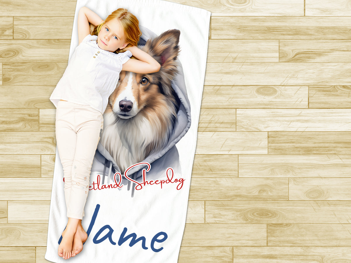 Personalisierte Decke mit Collie-Motiv in Weiß und Blau.