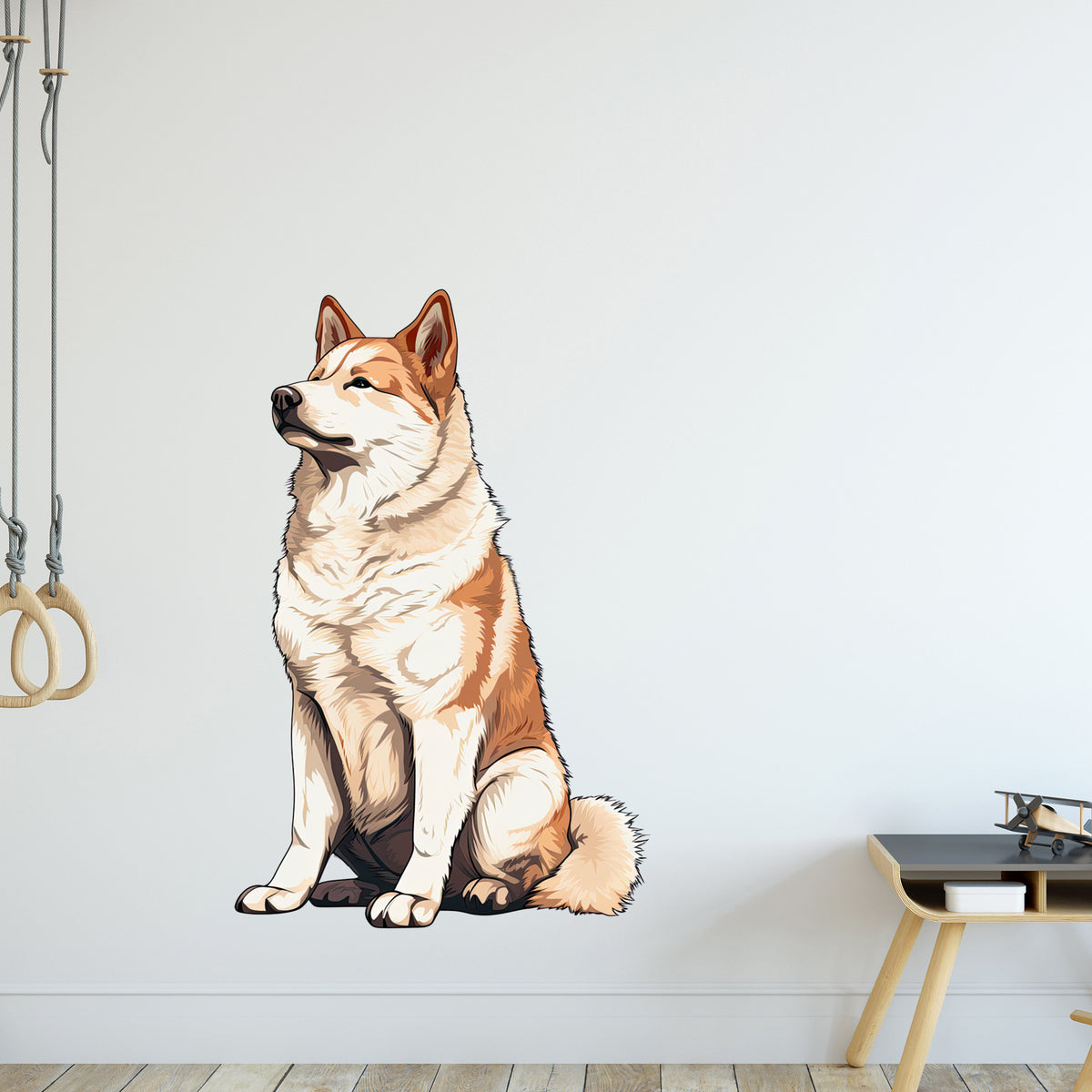 Sitzender Hund, orange-weiße Fellfarbe, stilisierte Wanddekoration.