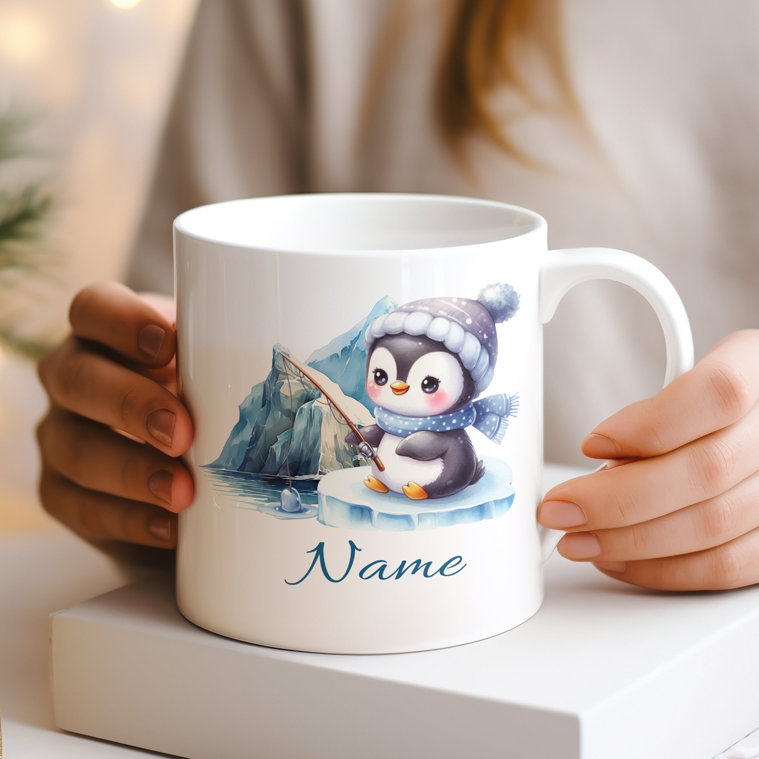 Tasse mit niedlichem Pinguin, blau und personalisiert.