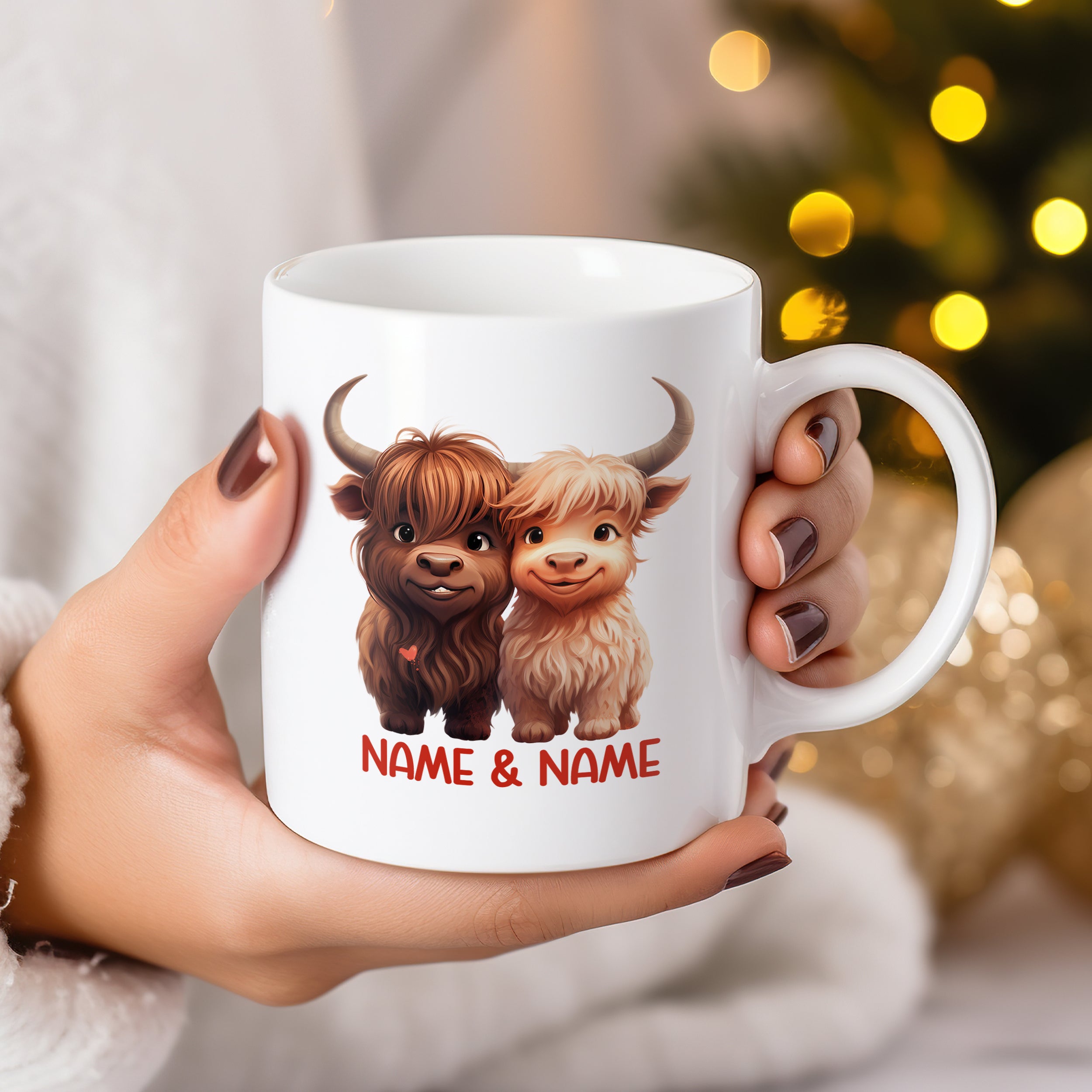 Tasse mit zwei niedlichen Hochlandrindern und Namen.