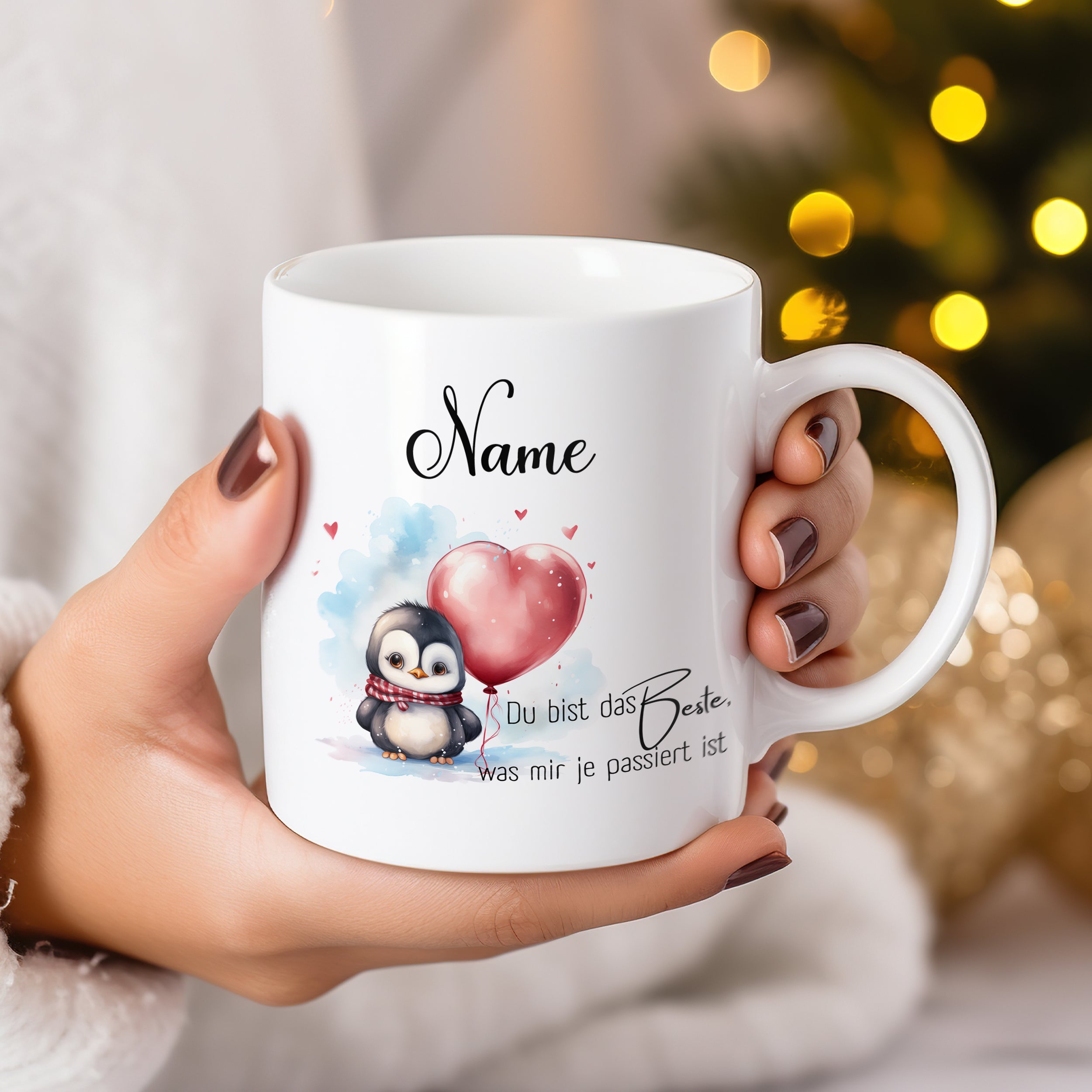 Tasse mit Pinguin, rotem Herz und persönlichem Namen.